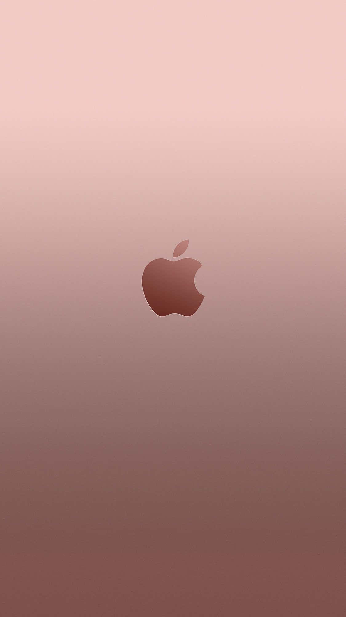桌布 壁紙 — 極簡漸變桌布，中央放置玫瑰金色調的Apple標誌，背景為柔和的粉紅到棕色。