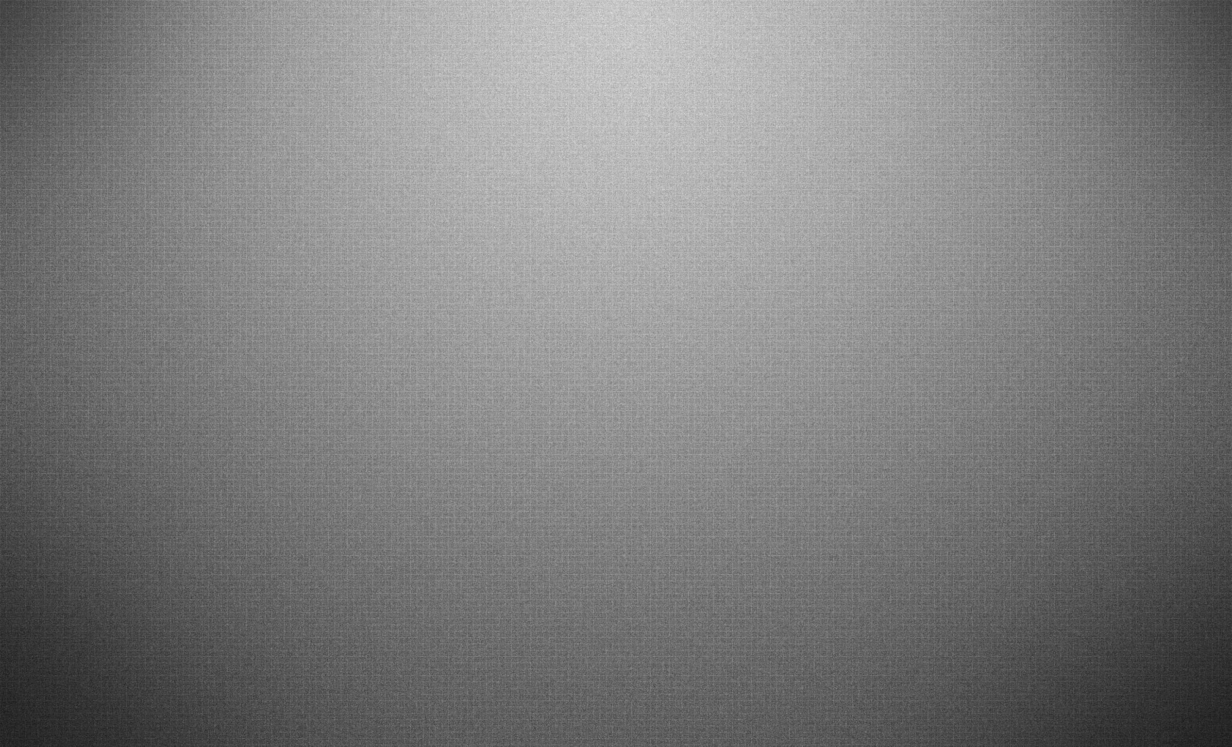 Gray Aesthetic 桌布 壁紙 — 極簡漸變灰色紋理，帶有細微的織物質感，光線從中心到邊緣柔和過渡。