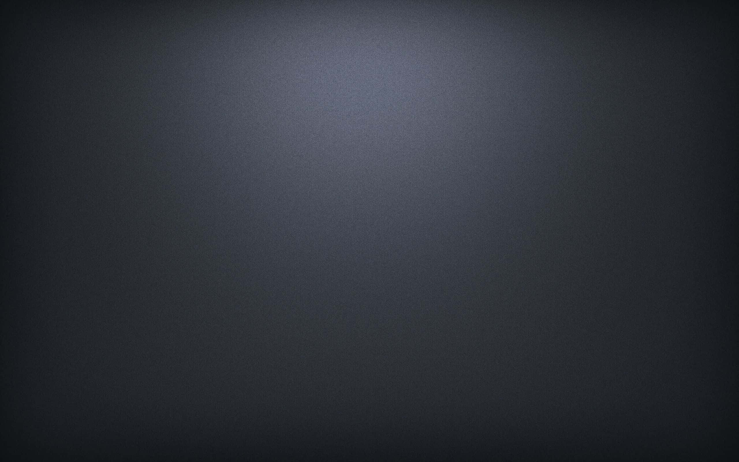 Grey Desktop 桌布 壁紙 — 極簡漸變背景，從深灰色過渡到淺灰色，帶有柔和光線。