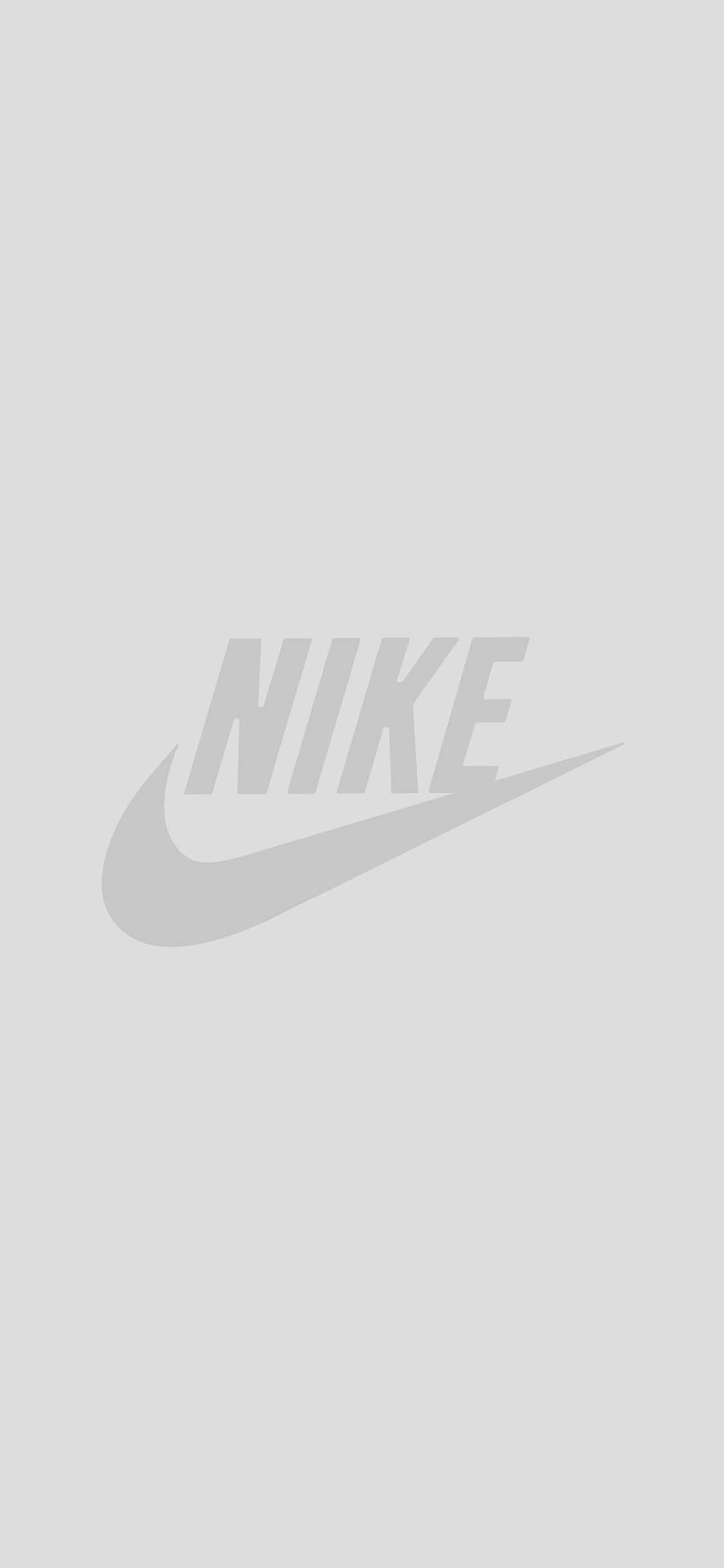 White iPhone 桌布 壁紙 — 極簡灰色Nike Swoosh標誌，居中於純淺灰色背景上。