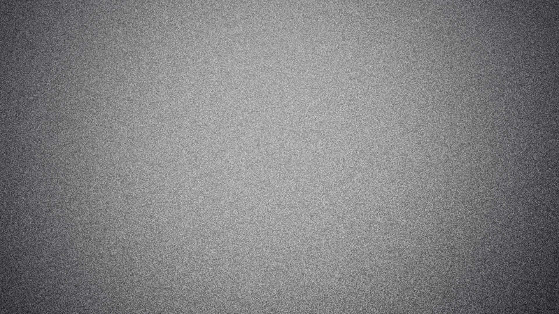 noise 桌布 壁紙 — 極簡灰色漸變背景，帶有細微紋理和柔和光線。