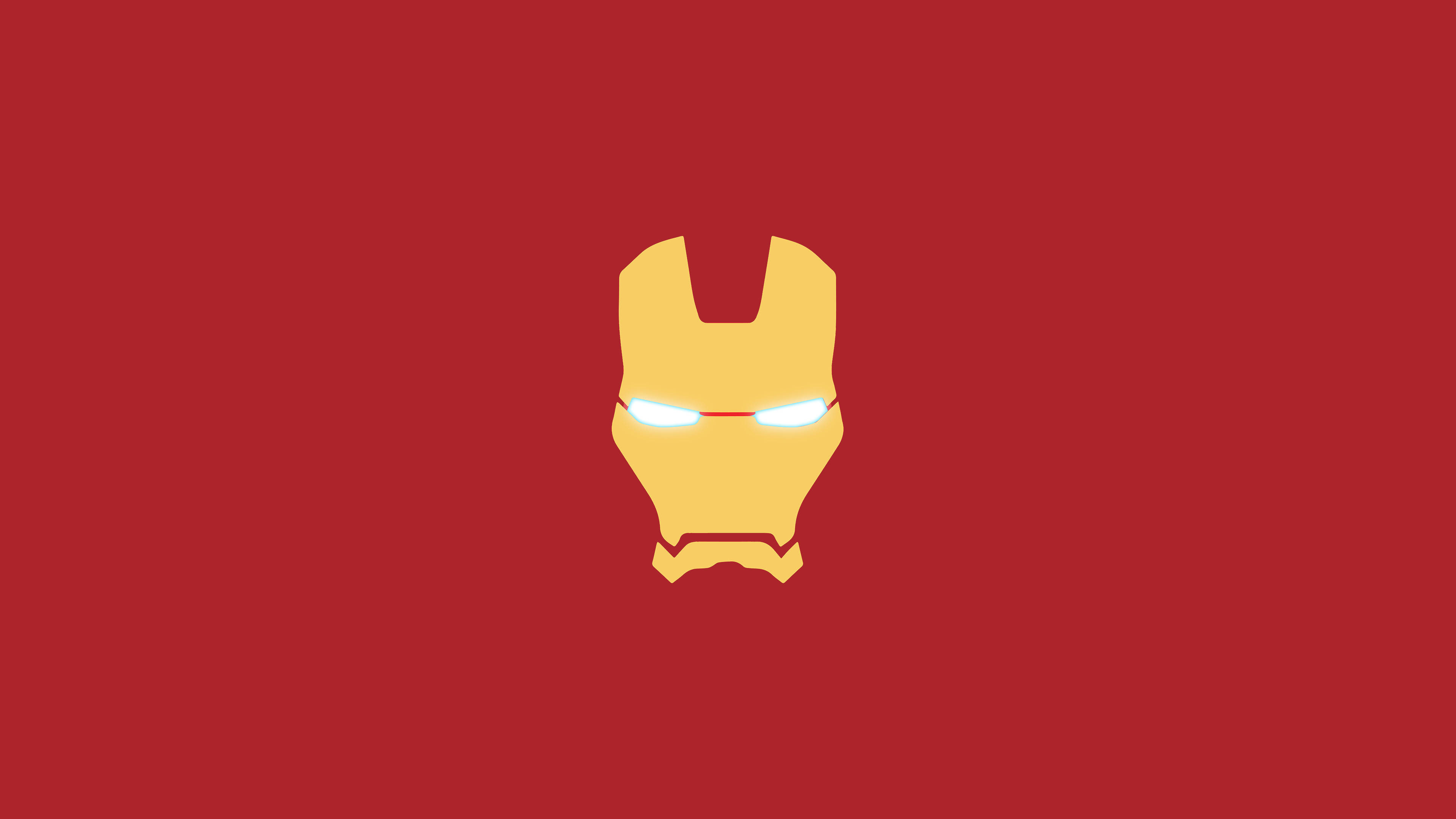 Iron Man Logo 桌布 壁紙 — 極簡金色鋼鐵人頭盔，帶有發光的白色眼睛，居中在純紅色背景上。