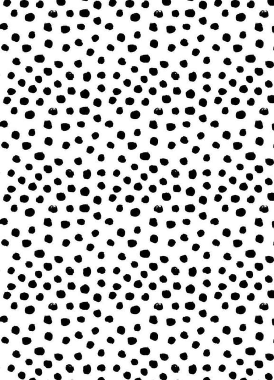 Black And White Dots 桌布 壁紙 — 極簡風格壁紙，在純白背景上散落黑色墨點，形成大膽的圖案。
