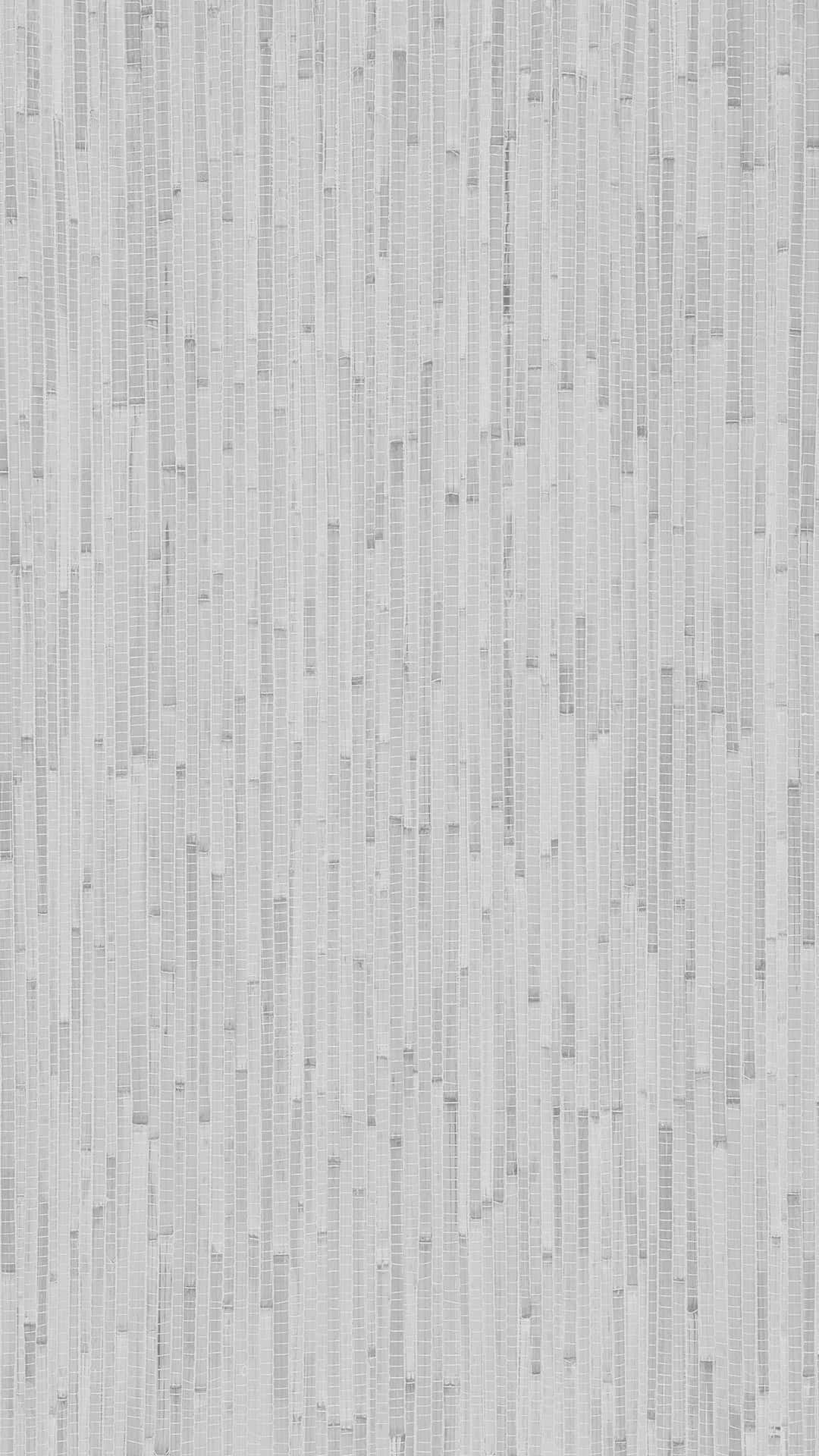Light Gray iPhone 桌布 壁紙 — 極簡風格壁紙，帶有垂直灰色紋理線條，營造出微妙的抽象圖案。