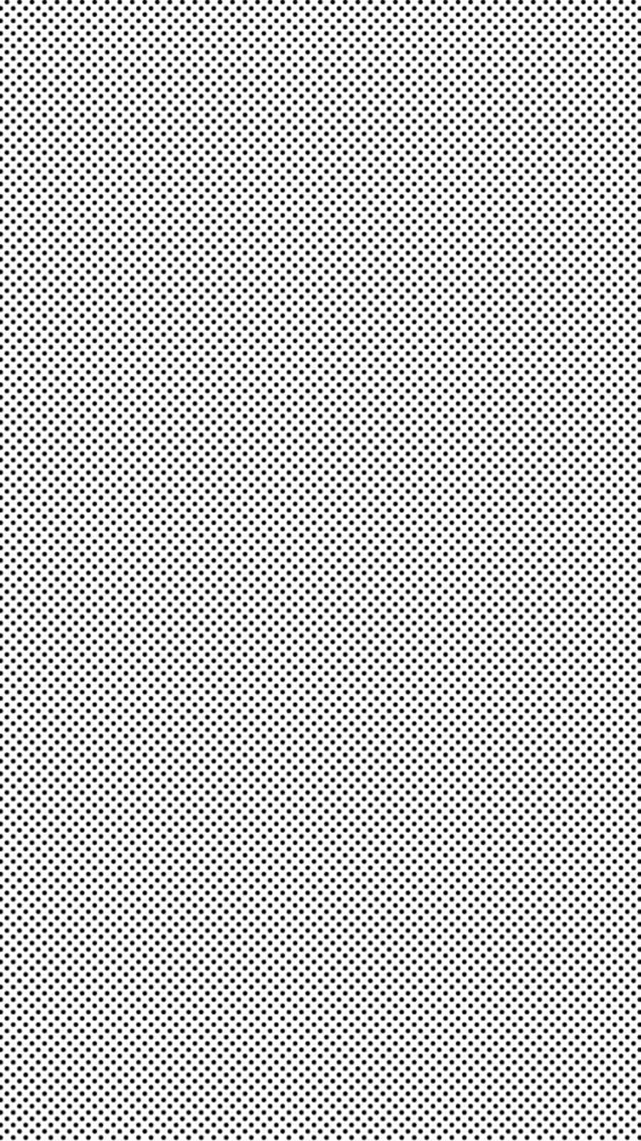 Black And White Dots 桌布 壁紙 — 極簡風格壁紙，白色背景上均勻分佈黑色圓點，營造出微妙的半色調紋理。
