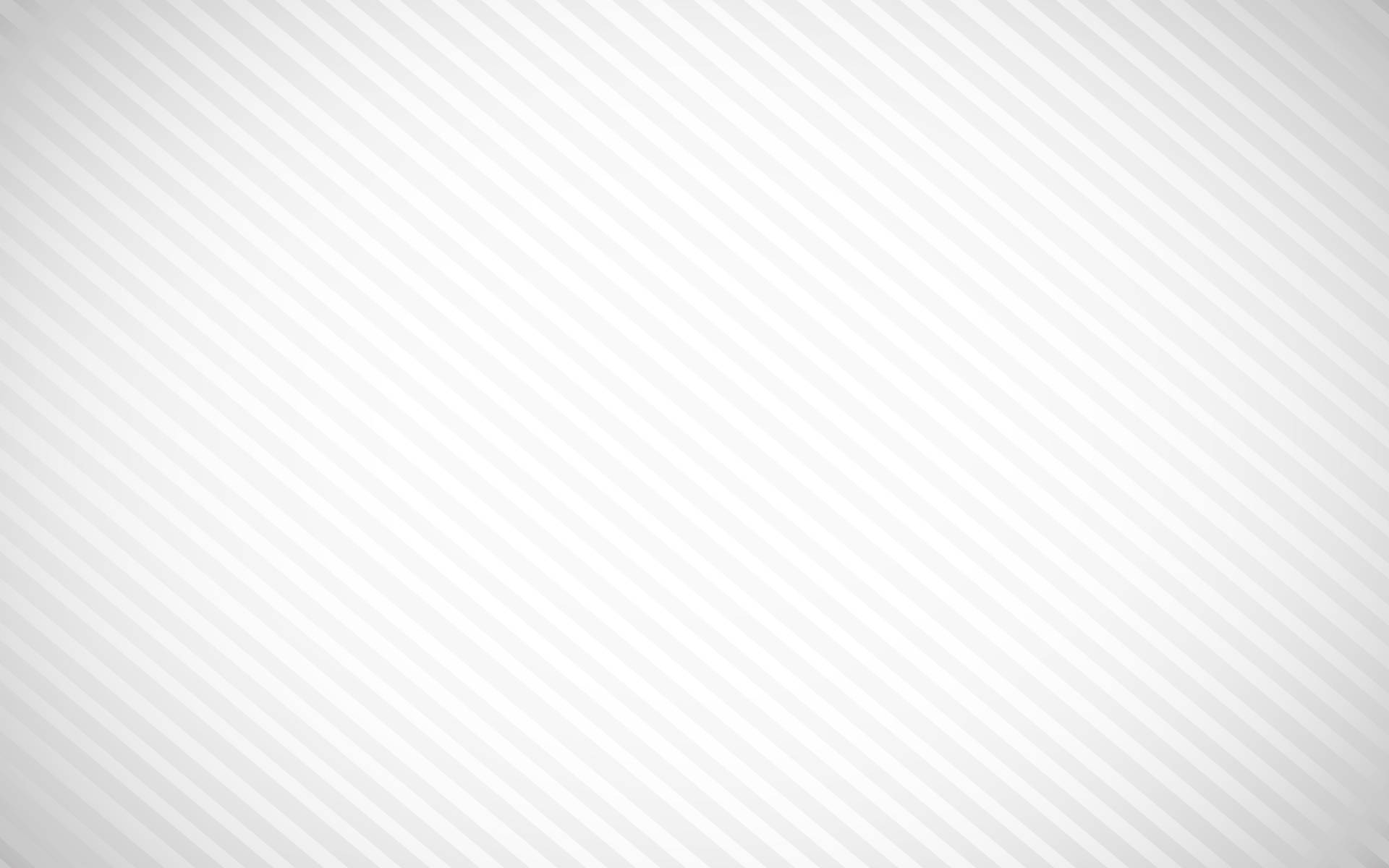 White Texture 桌布 壁紙 — 極簡風格桌布，帶有柔和的對角灰色條紋，邊緣漸變為白色。