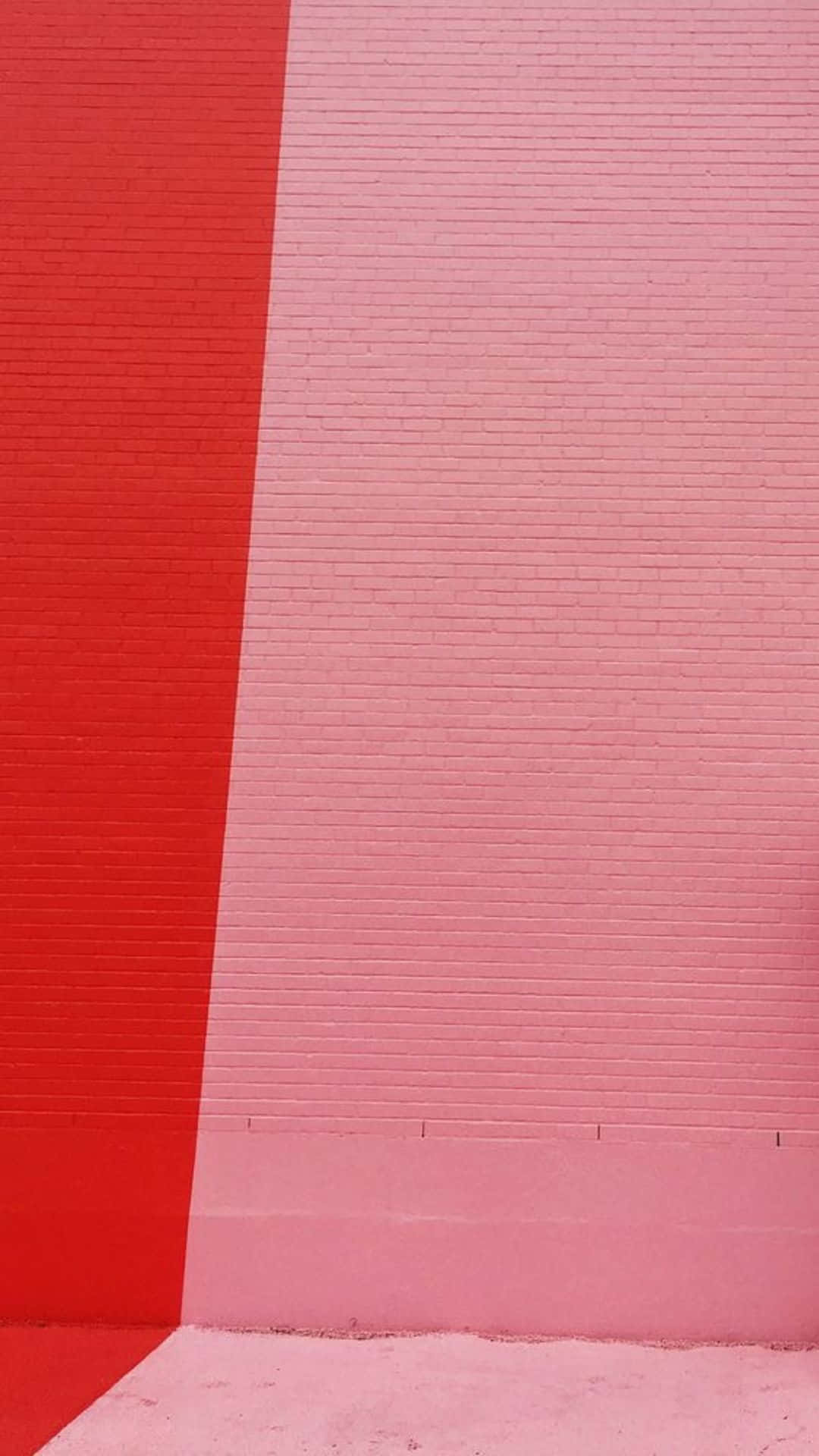Pink And Red 桌布 壁紙 — 極簡風格的磚牆，塗上大膽的紅色和柔和的粉紅色，帶有清晰的對角線分割。