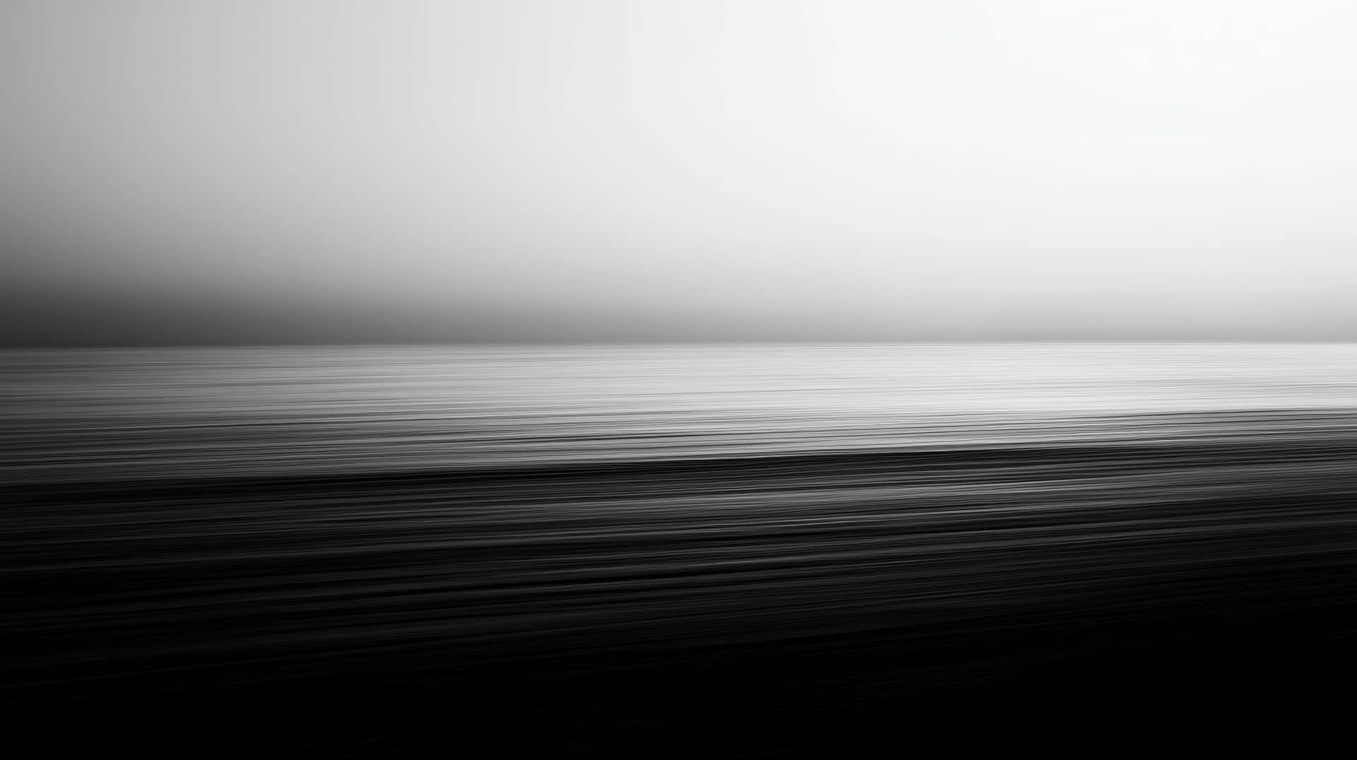 Minimalist black and white abstract horizon landscape 壁紙 — 極簡黑白抽象構圖，採用平滑的水平漸變，從深黑色過渡到柔和的白色。