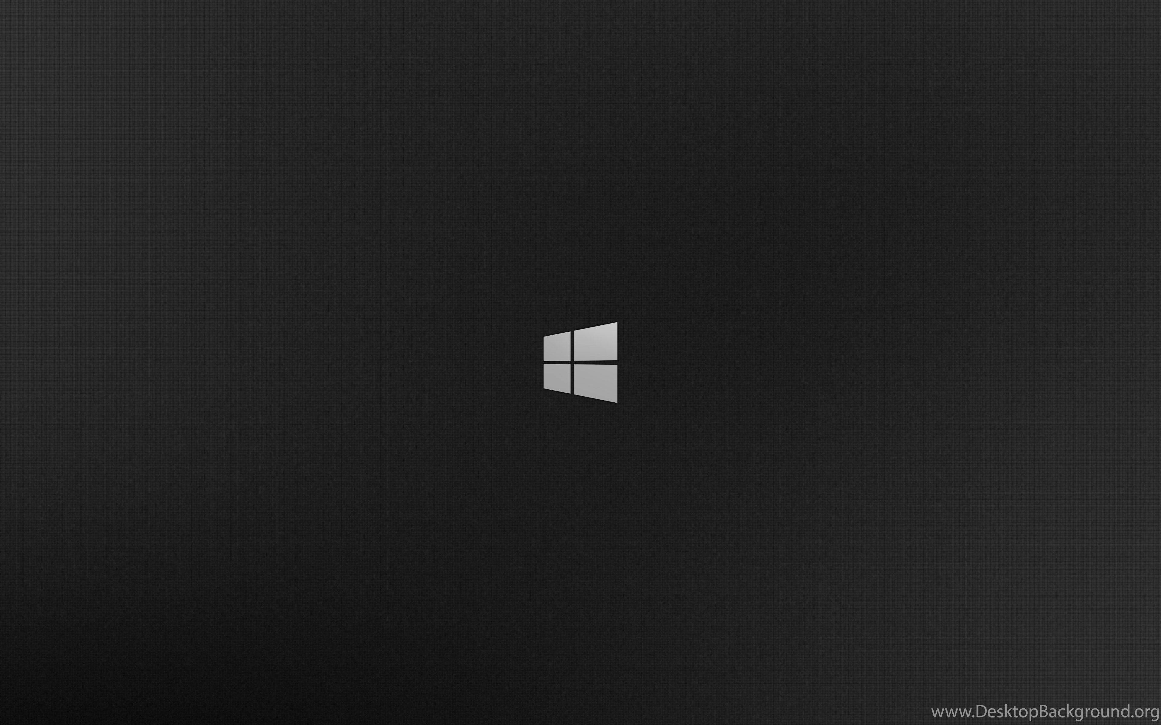 Windows 10 桌布 壁紙 — 極簡黑色桌布，中央帶有銀色Windows標誌，帶有微妙的漸變紋理。