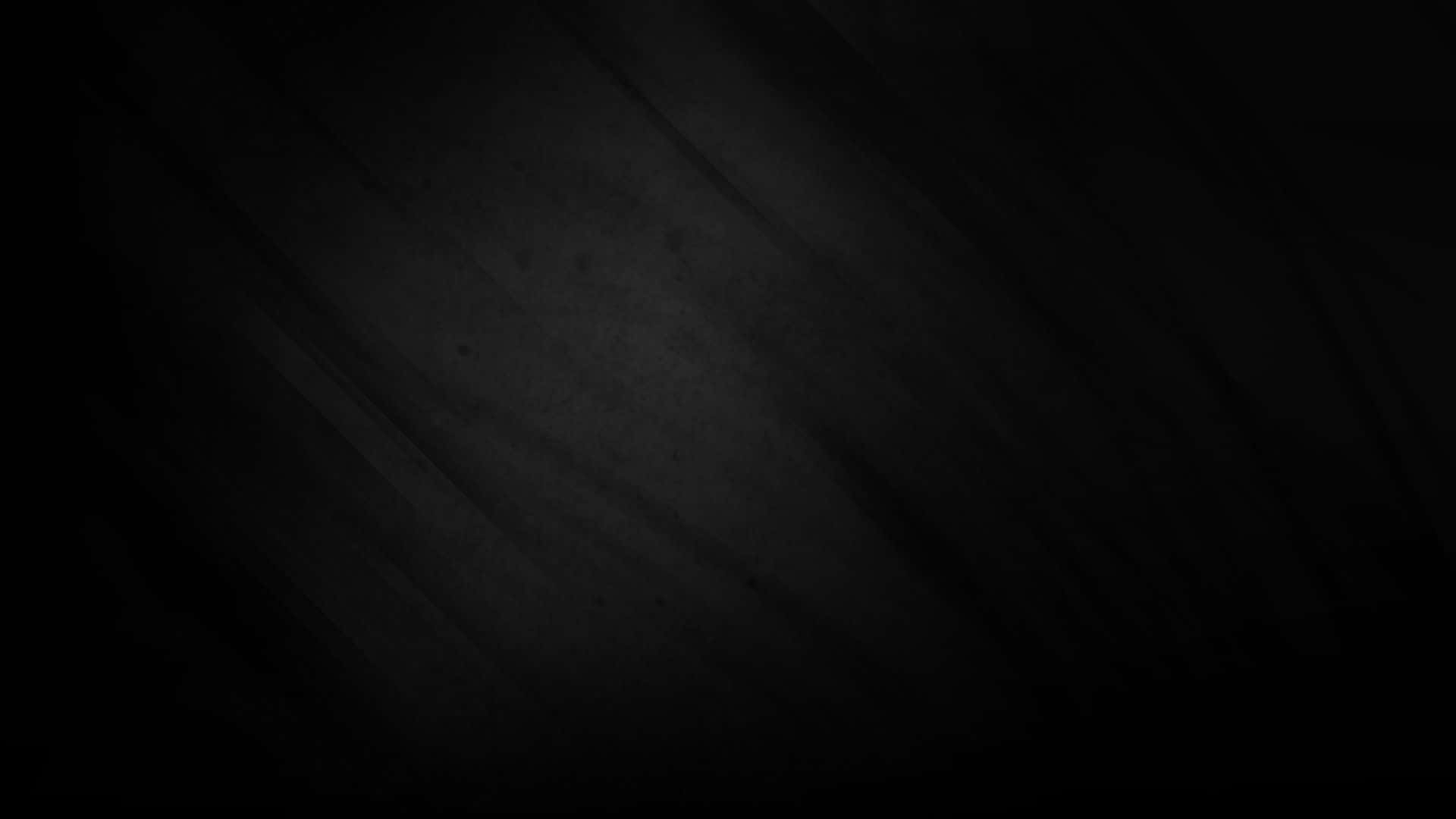 Vantablack 桌布 壁紙 — 極簡黑色紋理背景，帶有細微漸變和模糊筆觸圖案。