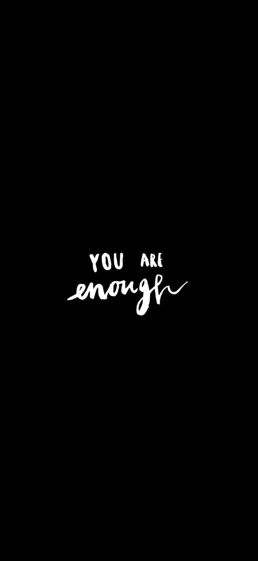Quote 桌布 壁紙 — 極簡黑色背景，中央有白色手寫文字 you are enough。