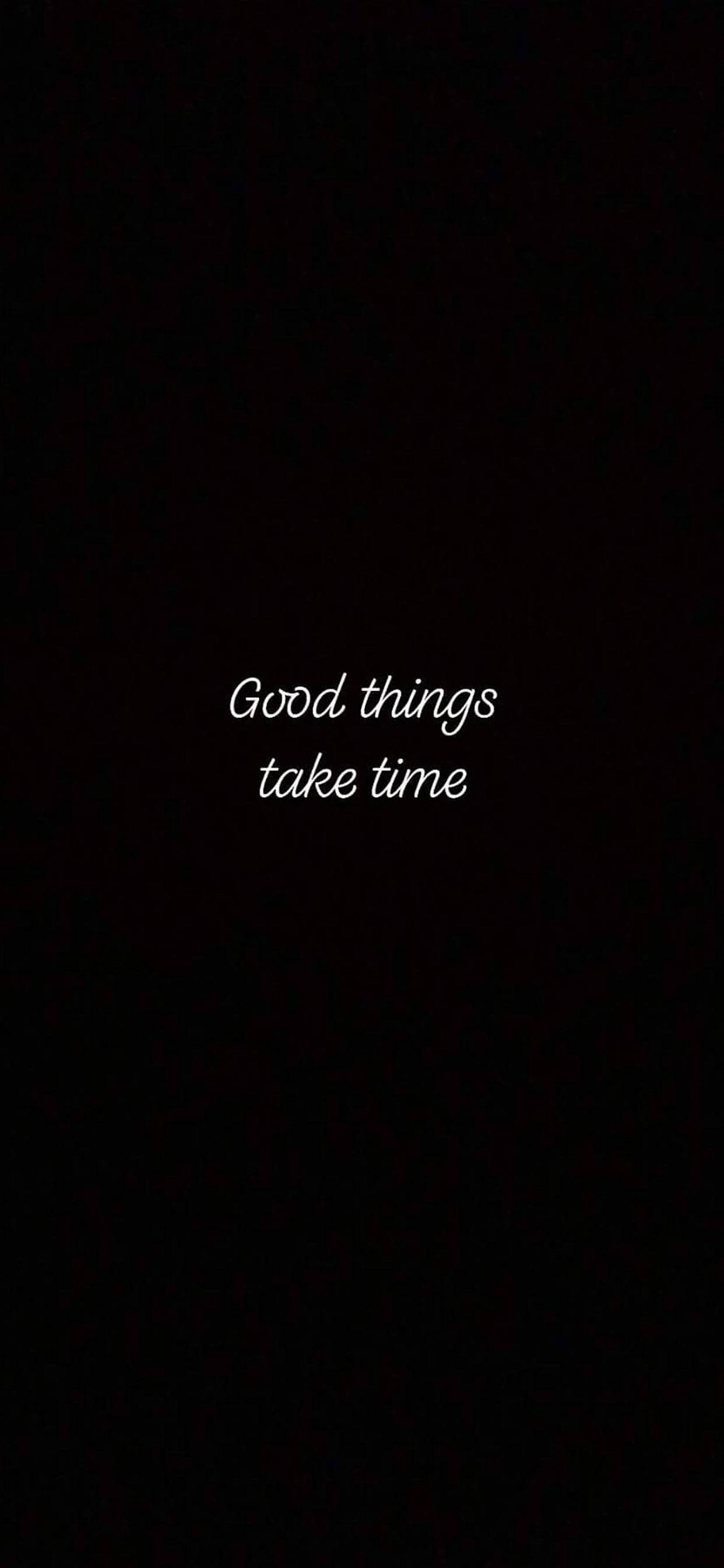 勵志 iPhone 桌布 壁紙 — 極簡黑色背景，中央有白色草書文字寫著「Good things take time」。