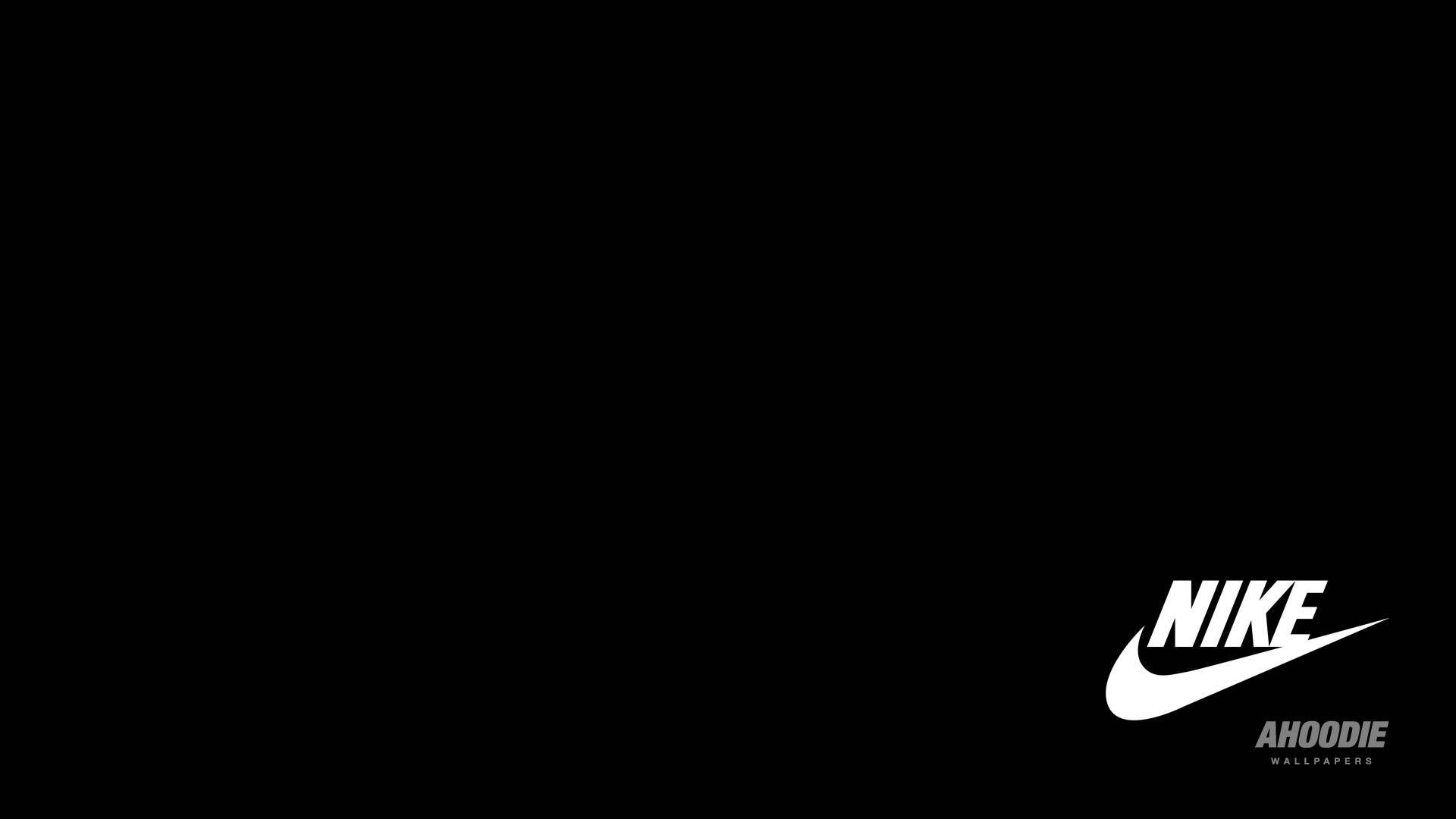 Nike iPhone 桌布 壁紙 — 極簡黑色背景，右下角有白色Nike swoosh標誌和文字。