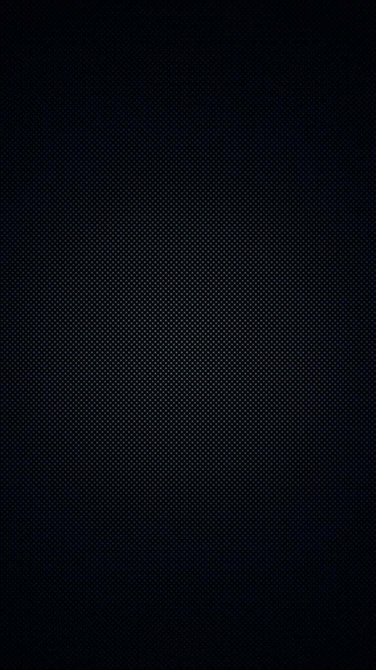Creative iPhone 桌布 壁紙 — 極簡黑色背景，帶有微妙的重複圓點圖案，營造出有紋理的數位表面。