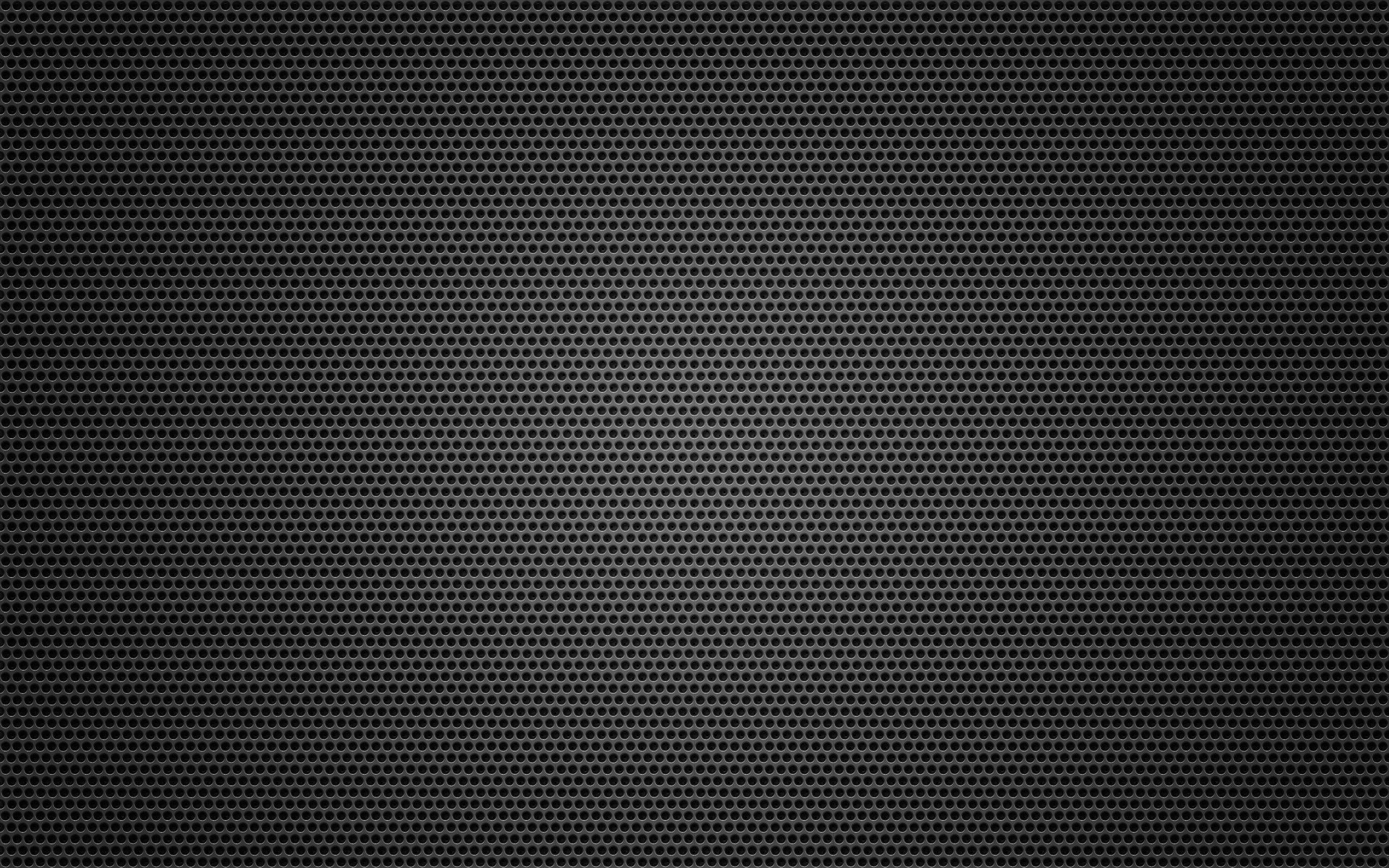 texture 桌布 壁紙 — 極簡黑色背景，帶有微妙的重複圓點圖案，營造出紋理化的數位表面。