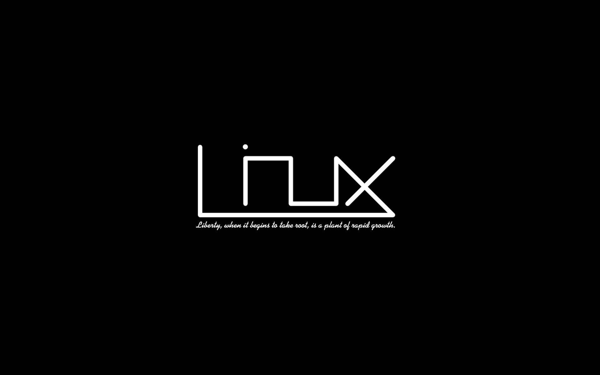 桌面 桌布 壁紙 — 極簡黑色背景，帶有白色風格化的Linux標誌和關於自由與成長的引言。