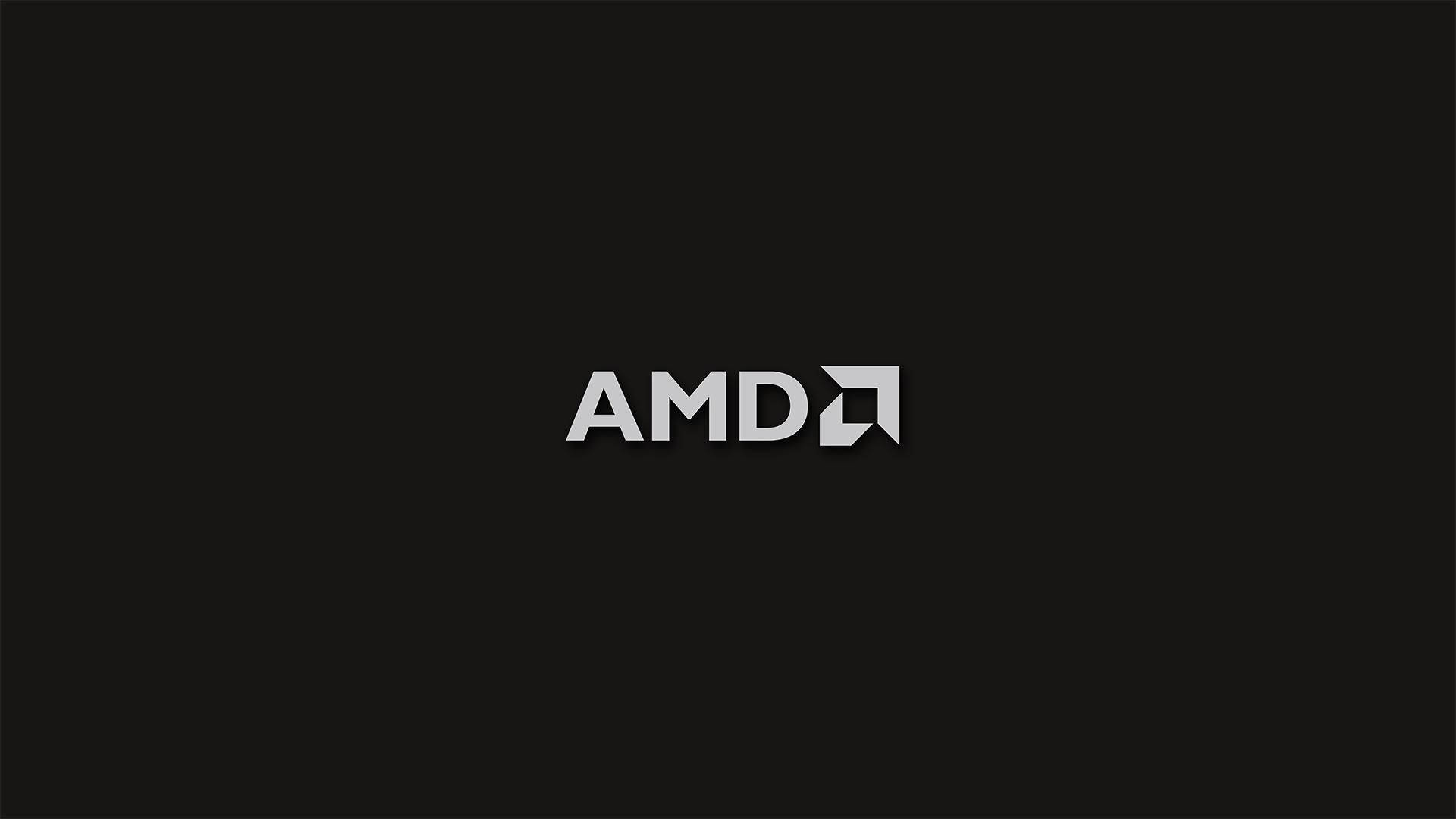 AMD 桌布 壁紙 — 極簡黑色背景，白色AMD標誌居中，邊緣乾淨銳利。