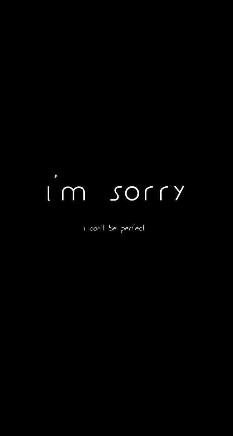 桌布 壁紙 — 極簡黑色背景，白色文字「i'm sorry i can't be perfect」居中。