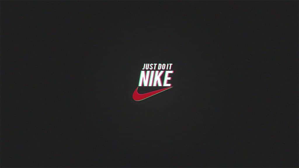 Nike 桌布 壁紙 — 標誌性的Nike標誌，帶有「Just Do It」口號，居中在深色紋理背景上。