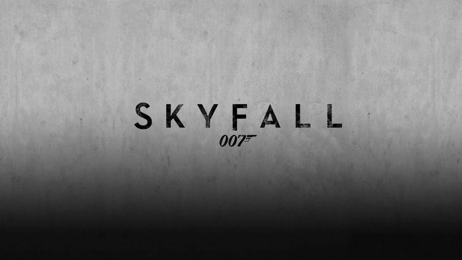 Bond 桌布 壁紙 — 標題「SKYFALL」和「007」標誌以粗體黑色字體印在紋理灰色混凝土牆上，底部漸變為黑色。