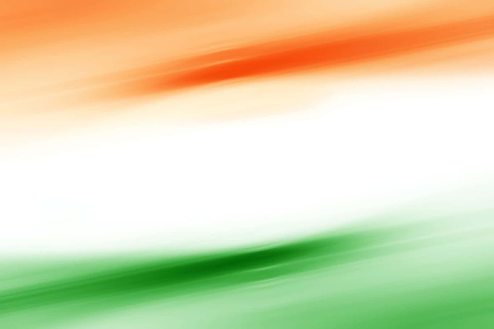 Republic Day 桌布 壁紙 — 模糊的動態條紋，以藏紅花、白色和綠色呈現，在動態抽象構圖中喚起印度國旗的意象。
