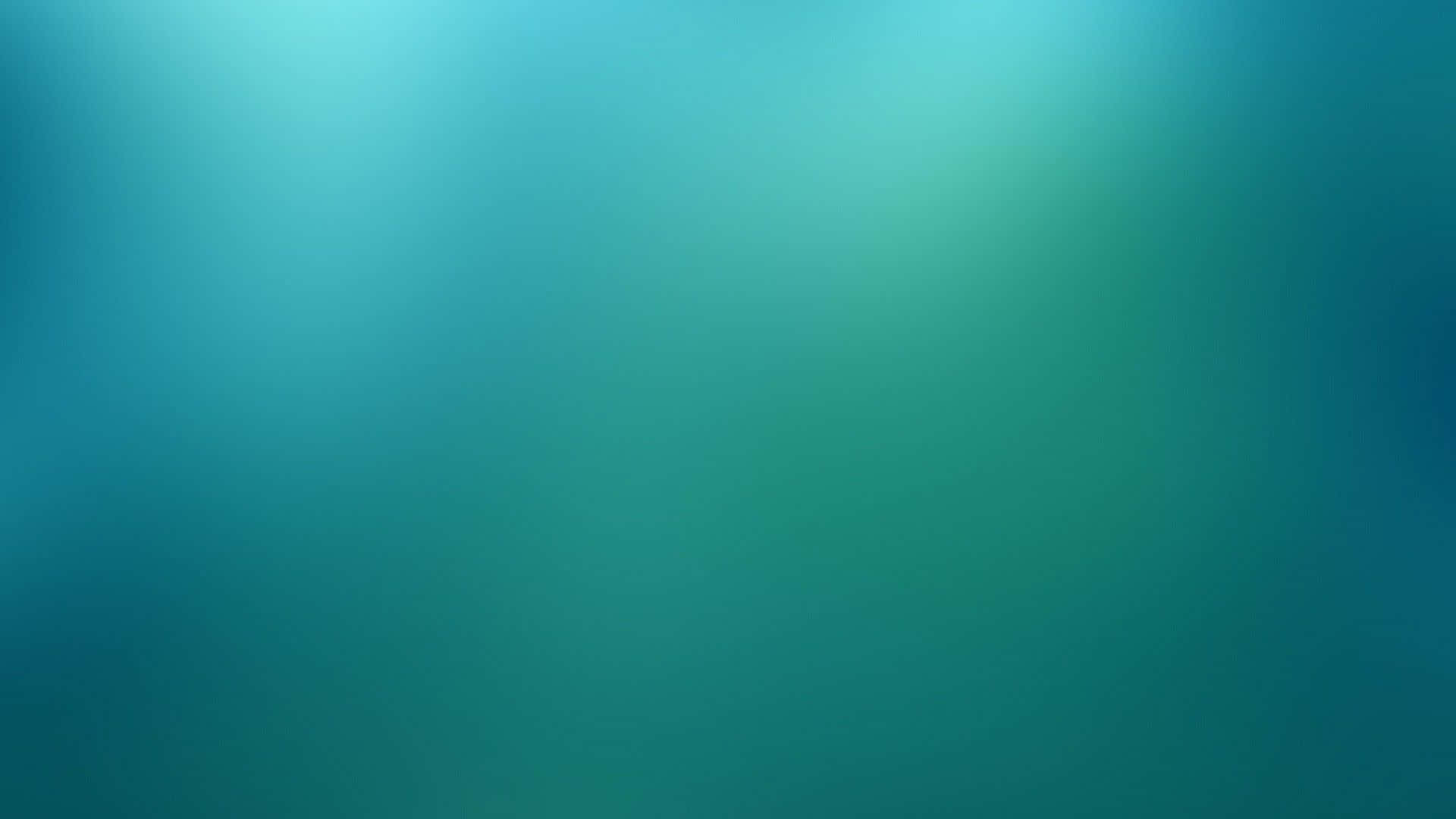 模糊的藍色背景，帶有綠色和藍色色調 壁紙