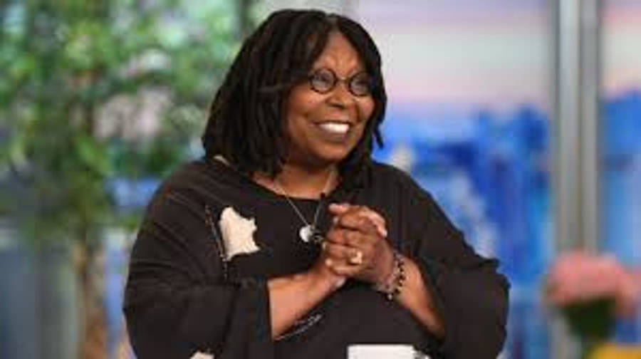 Celebrity 桌布 壁紙 — 歐普拉·溫芙瑞在明亮的攝影棚中微笑，背景是模糊的綠色和藍色。