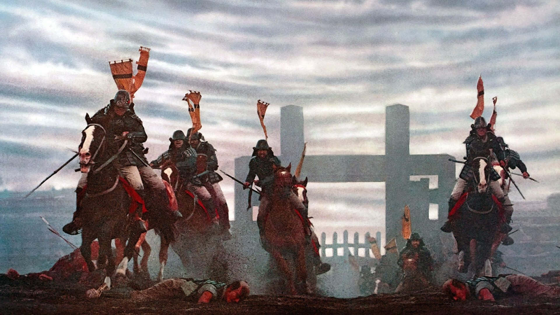 Samurai Movies 桌布 壁紙 — 武士騎兵在陰雲密布的天空下，衝過有陣亡士兵的戰場。