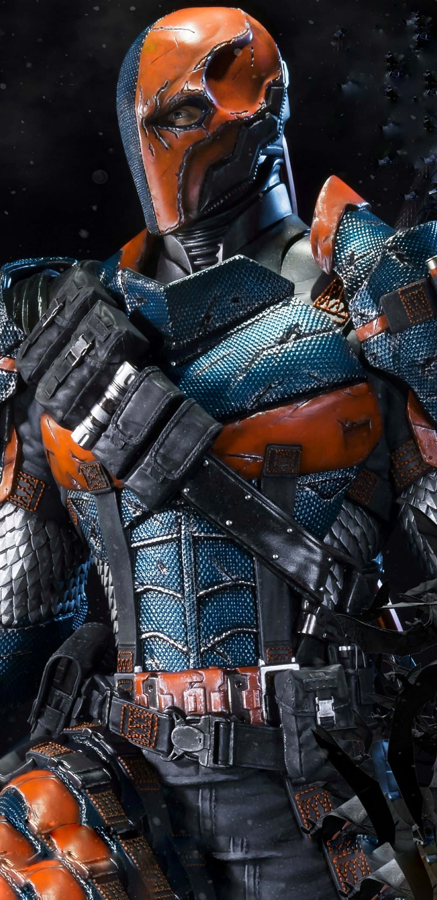 Pixel 3xl Batman Arkham City 桌布 壁紙 — 死亡箭角色身穿橙色和藍色裝甲服的近距離特寫，背景是黑暗的星空。