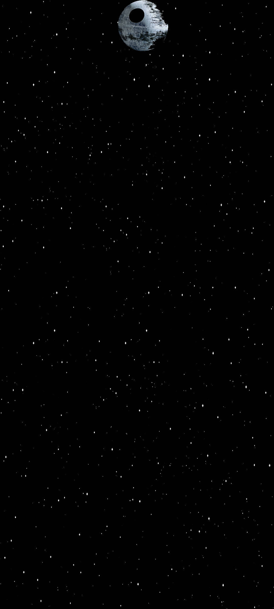 星際大戰 桌布 壁紙 — 死星在深空的星場中顯得巨大，其標誌性的球形輪廓主宰著黑色的虛空。