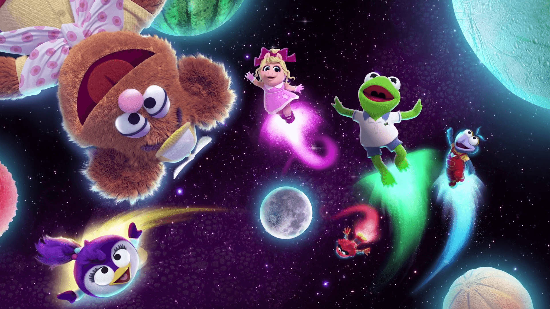 babies 桌布 壁紙 — 毛茸茸的Muppet角色在充滿活力的宇宙場景中翱翔，有發光的行星和佈滿星星的太空。