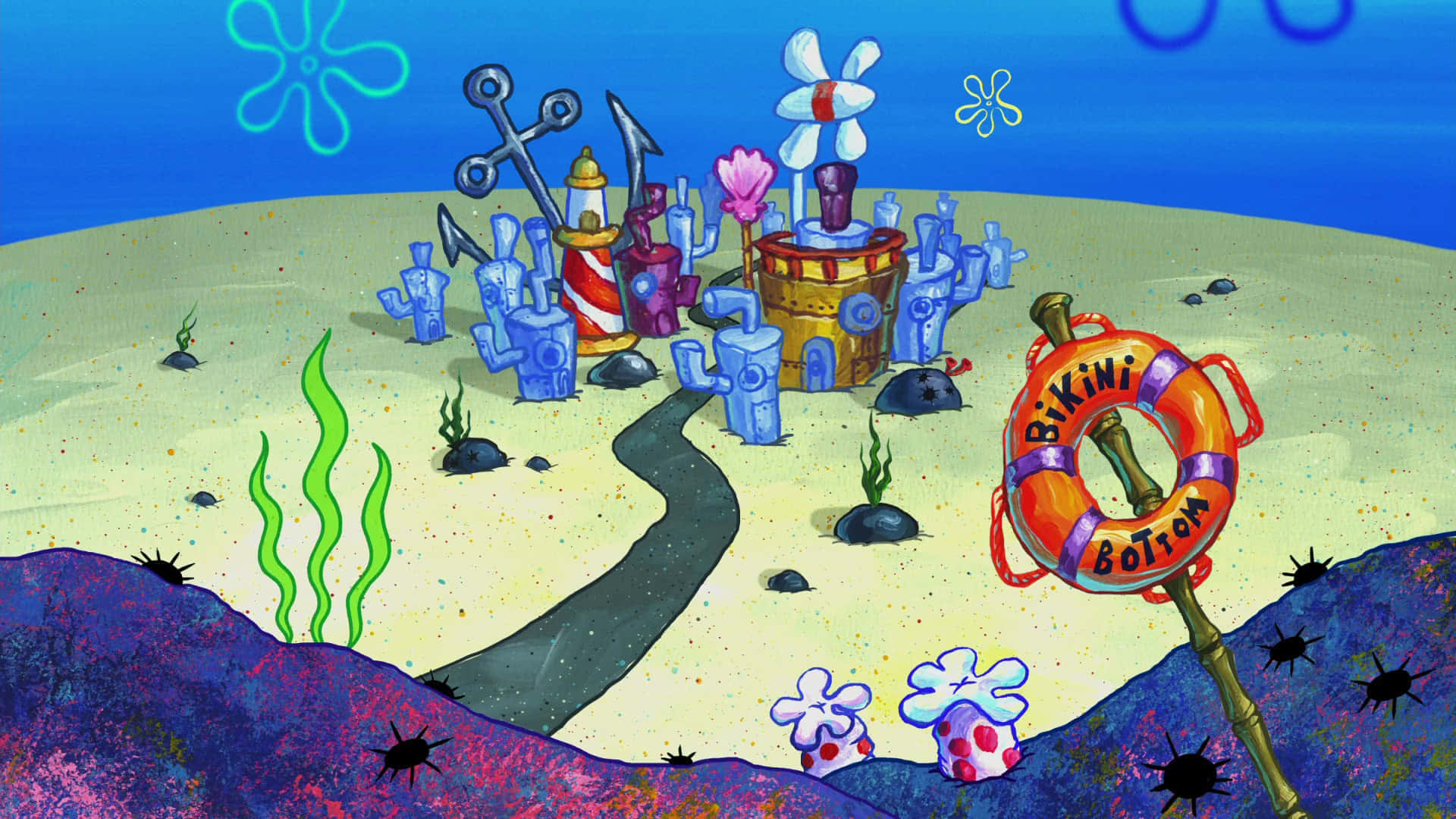 Spongebob Zoom 桌布 壁紙 — 水下卡通小鎮比奇堡，有藍色房屋、珊瑚植物和救生圈標誌。