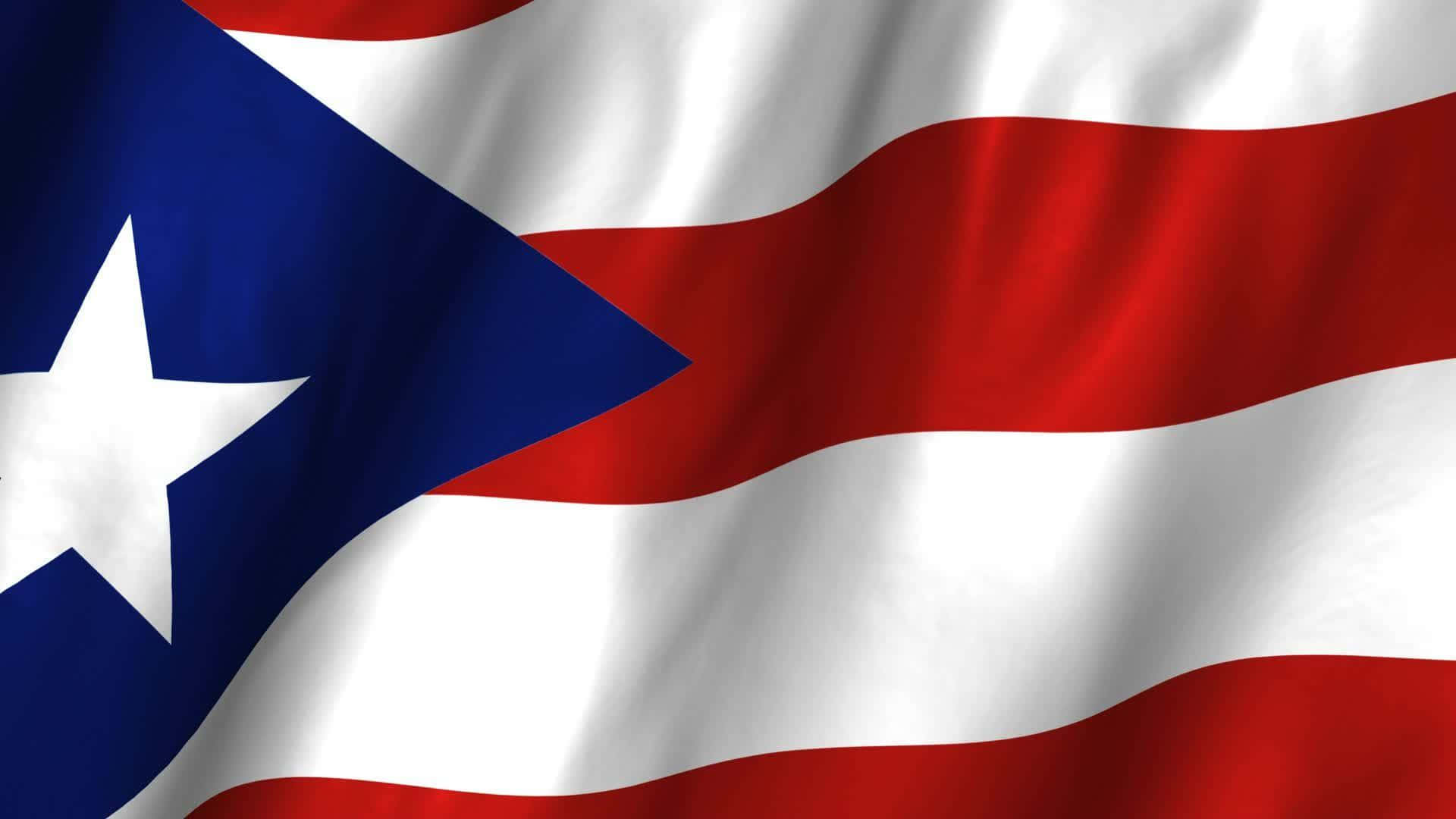 Puerto Rican 桌布 壁紙 — 波多黎各旗幟動態飄揚，帶有紅白條紋和一個帶有白色星星的藍色三角形。