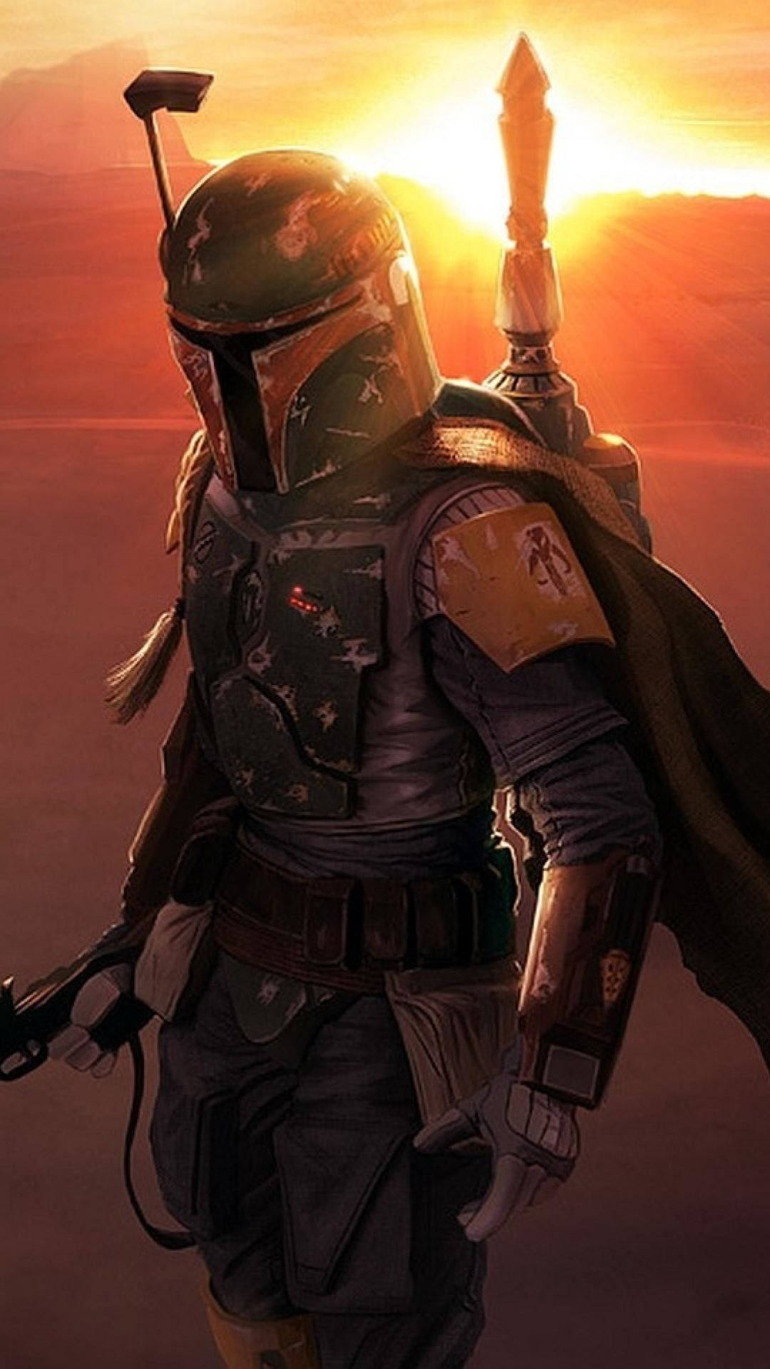 Boba 桌布 壁紙 — 波巴·費特在沙漠夕陽下站立，手持爆能槍，斗篷在身後飄揚。