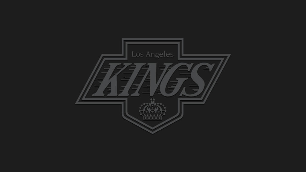 Los Angeles Kings 桌布 壁紙 — 洛杉磯國王隊標誌以單色呈現，置於帶有細微紋理的深色背景上。