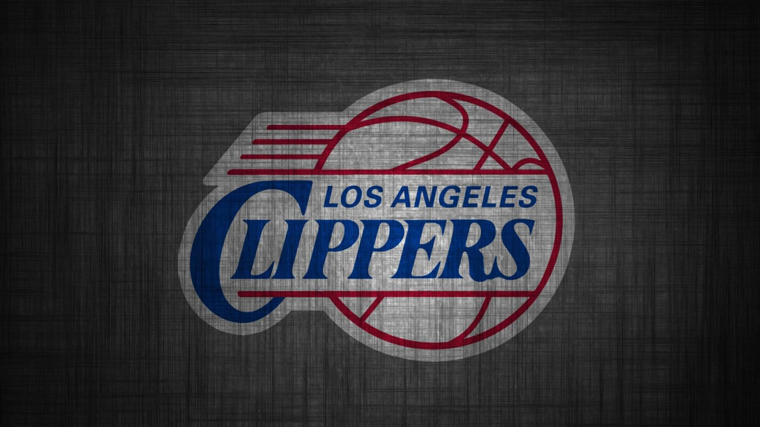 Clippers 桌布 壁紙 — 洛杉磯快艇隊標誌，紅、藍、白色，置於深色紋理背景上。