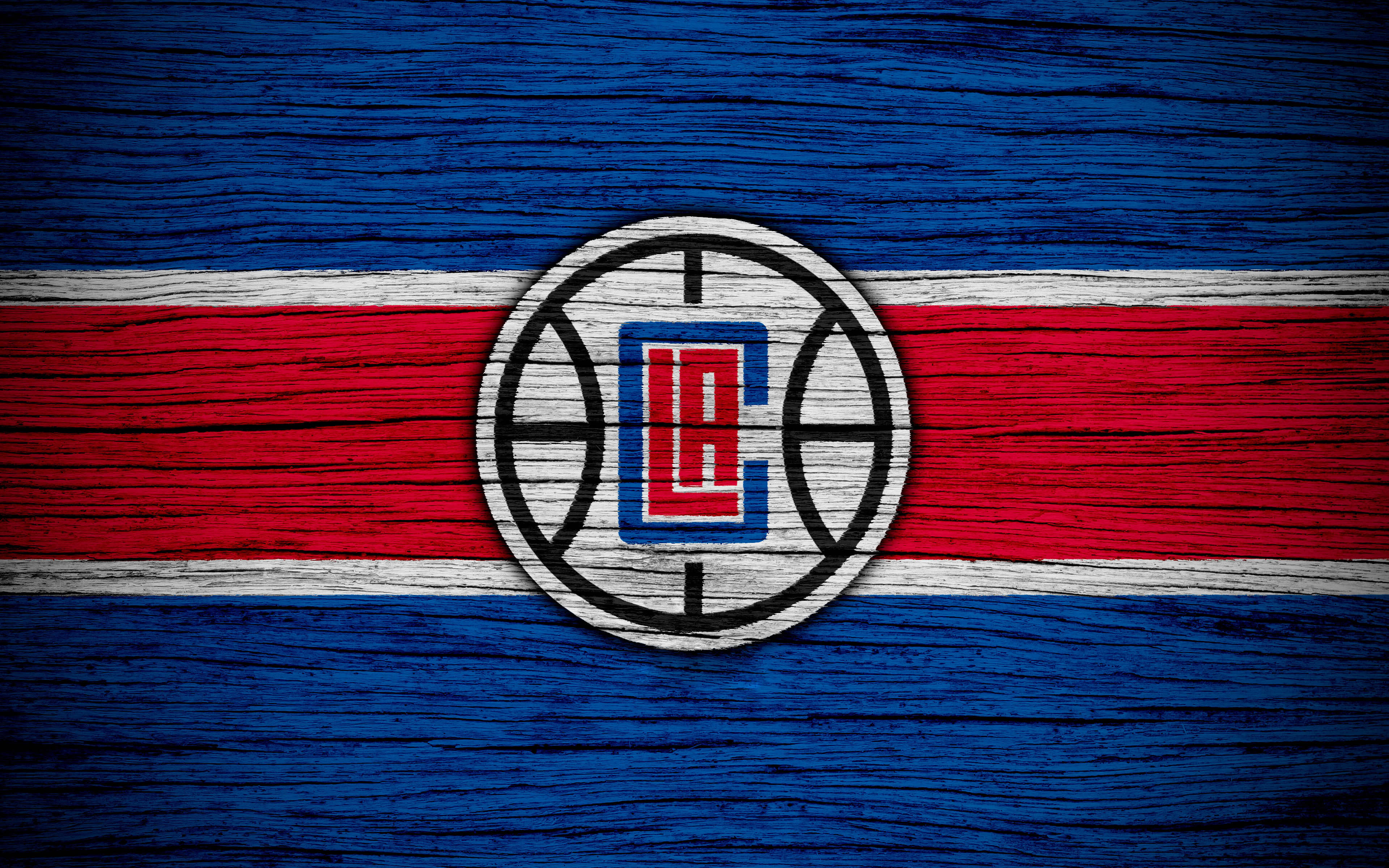 Clippers 桌布 壁紙 — 洛杉磯快艇隊標誌繪製在風化的木板上，帶有紅、白、藍條紋。