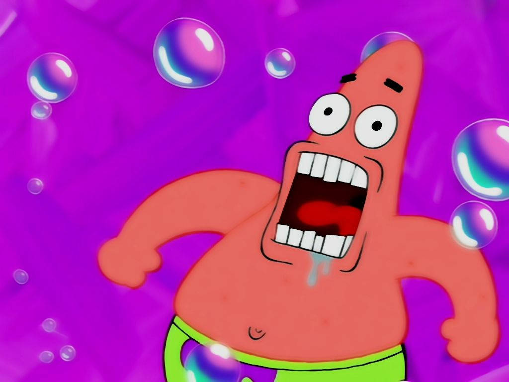 Patrick 桌布 壁紙 — 派大星在鮮豔的紫色背景上被彩虹色泡泡包圍，震驚地尖叫。