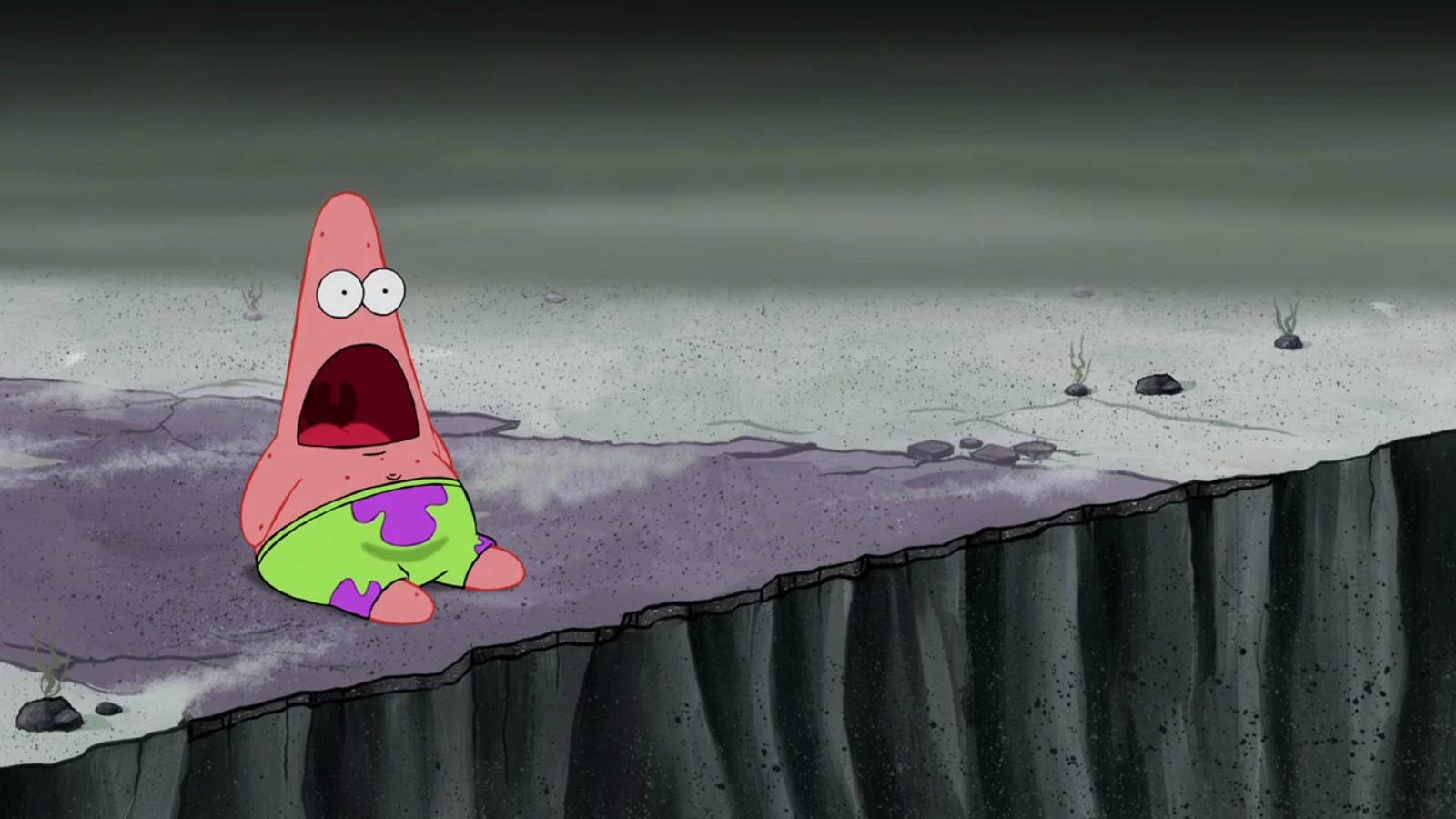 spongebob squarepants 桌布 壁紙 — 派大星坐在黑暗深淵邊緣，在卡通水下場景中驚恐尖叫。