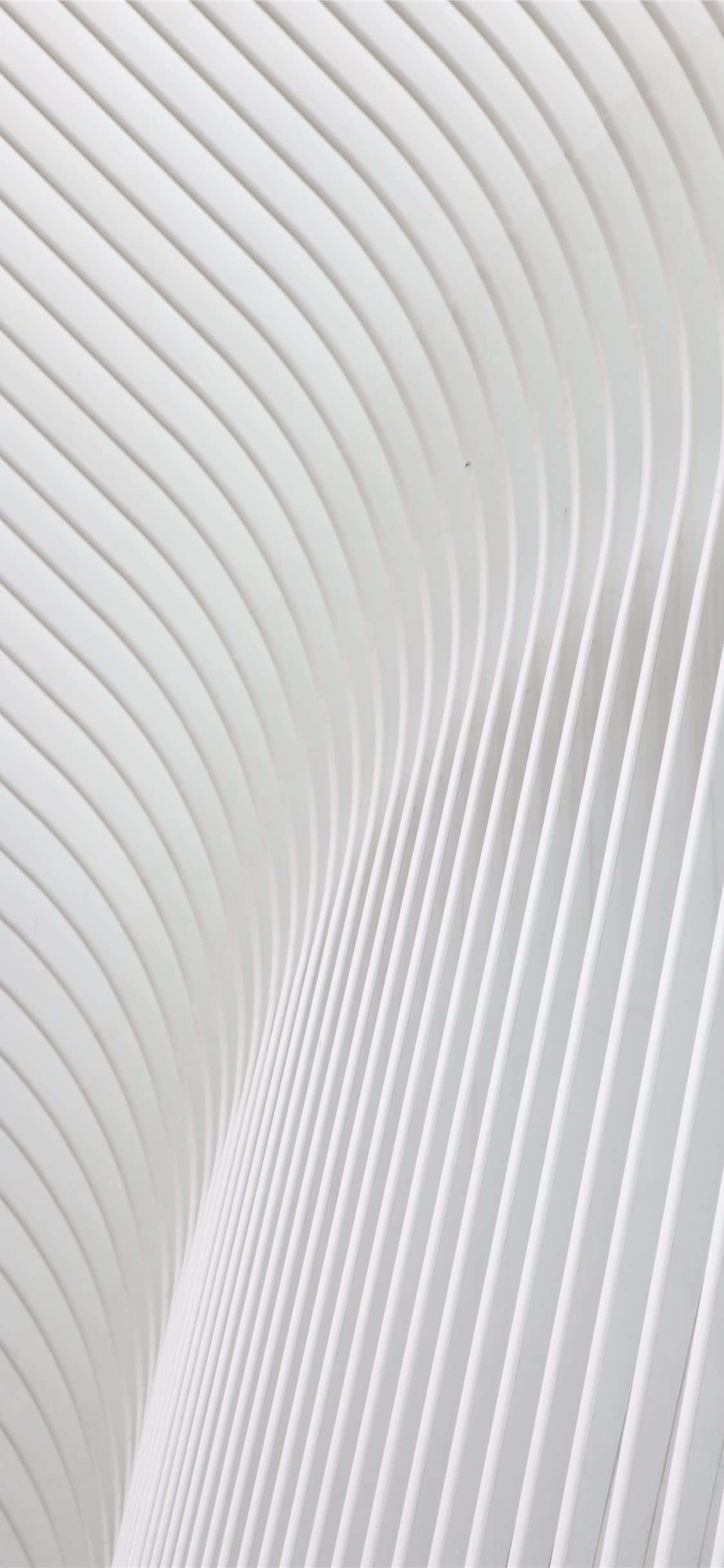 Cool Design iPhone 桌布 壁紙 — 流動白色曲線建築線條的特寫，營造出極簡抽象圖案。