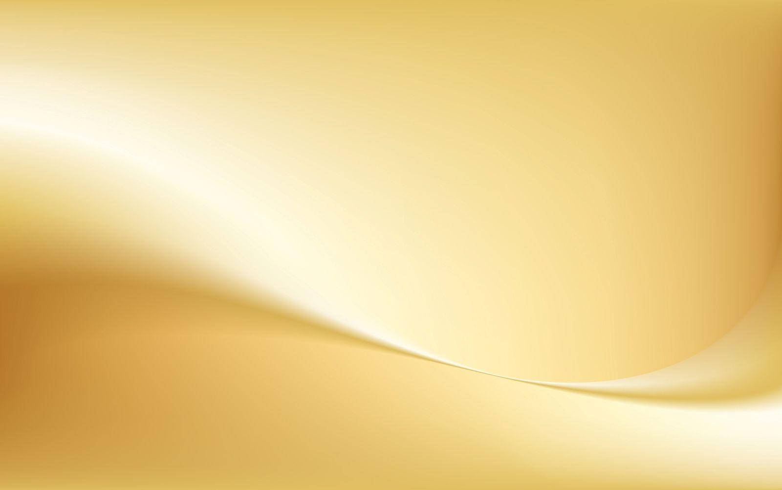 Gold Abstract 桌布 壁紙 — 流暢的金色波浪漸變，帶有柔和的光線高光，營造出奢華的抽象背景。