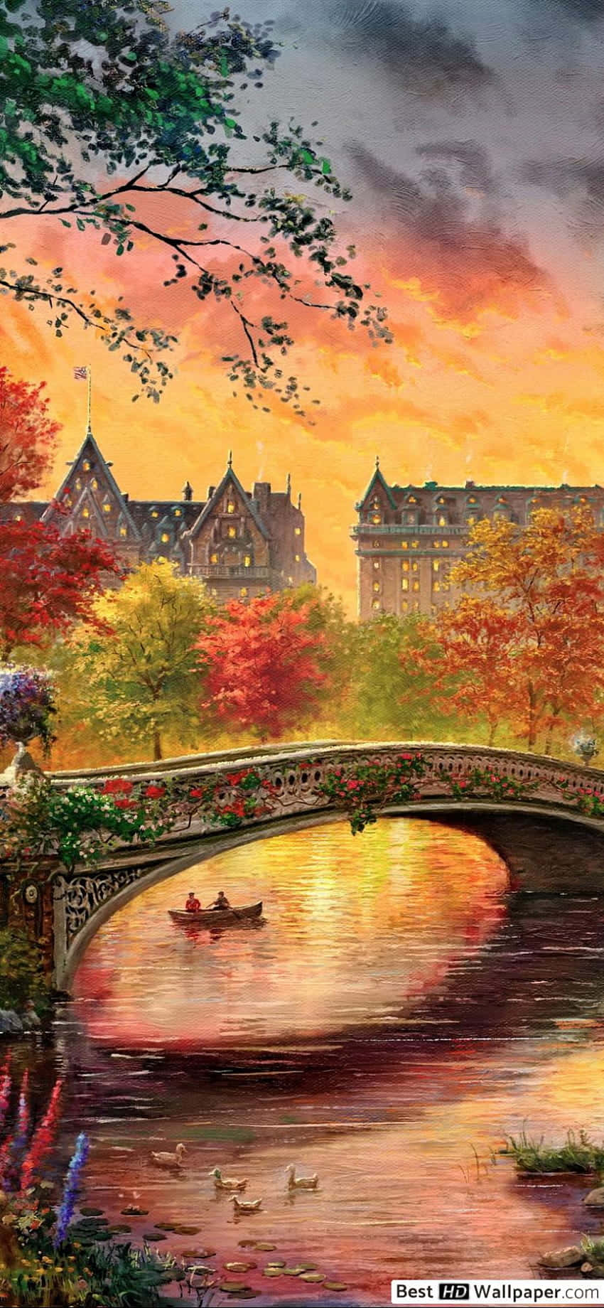 Vintage Autumn 桌布 壁紙 — 浪漫的日落場景，有一座石橋橫跨河流，兩人在充滿活力的秋樹和發光的建築物下划船。