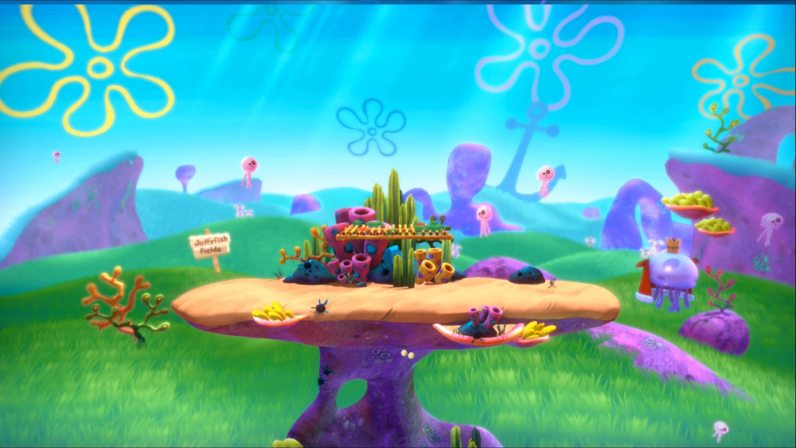 Jellyfish Fields 桌布 壁紙 — 海綿寶寶中充滿活力的海底場景，有水母田和色彩繽紛的珊瑚形成，在明亮的藍色海水下。