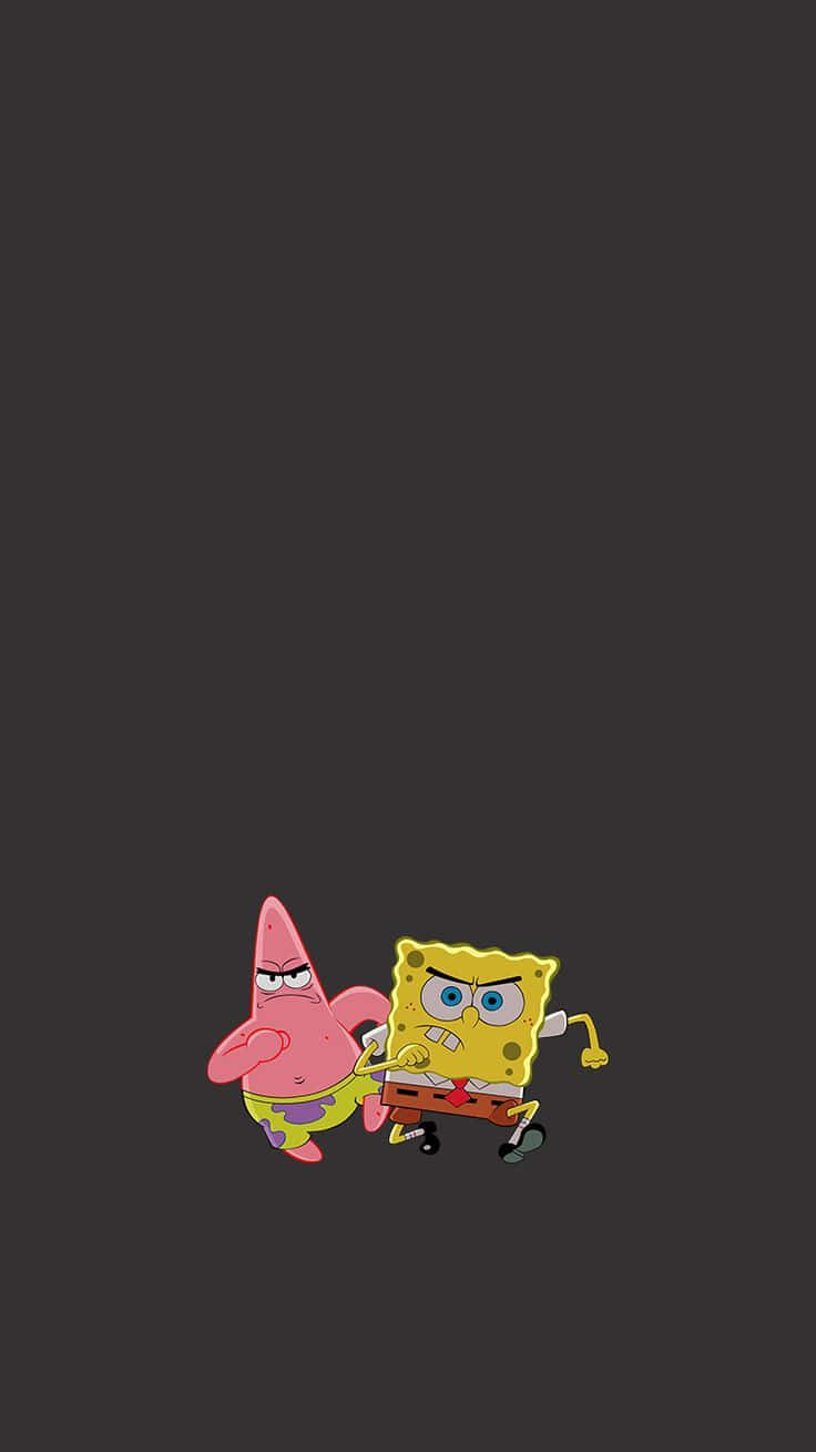Cartoon Characters 桌布 壁紙 — 海綿寶寶和派大星在深灰色背景前憤怒地拉扯對方的胳膊。