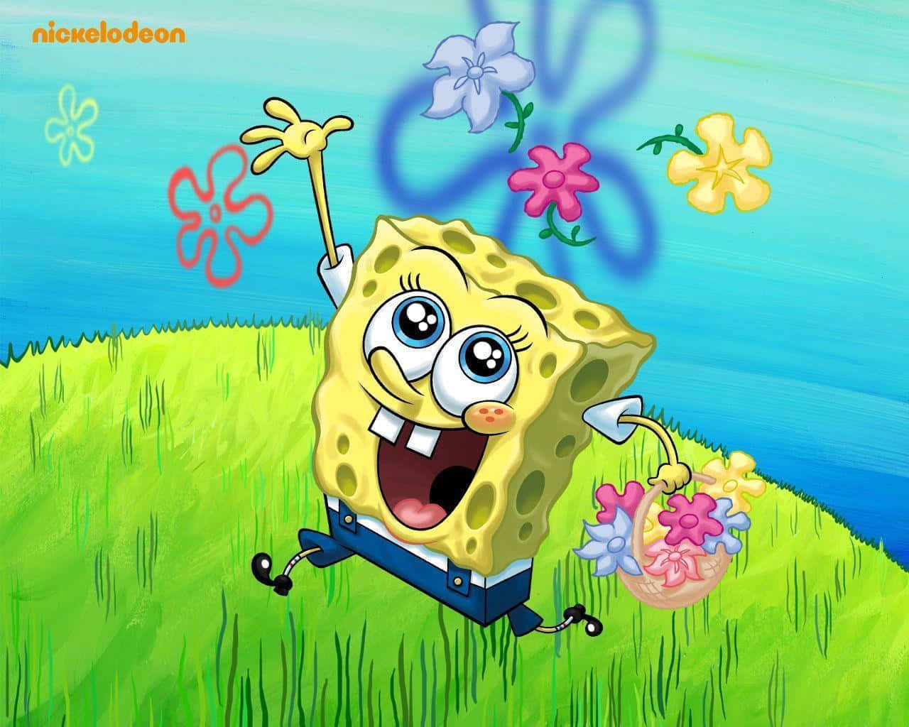spongebob squarepants 桌布 壁紙 — 海綿寶寶在晴朗的藍天下，拿著一籃色彩繽紛的花朵，開心地跑過一個草地山丘。