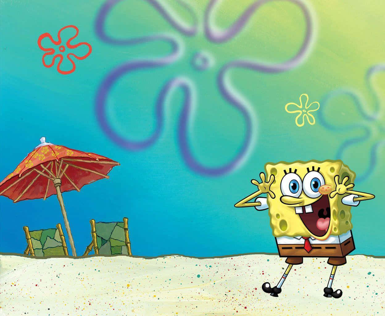 spongebob squarepants 桌布 壁紙 — 海綿寶寶在紅色沙灘傘下的沙灘上快樂地揮手，藍綠色水中有色彩繽紛的水母。