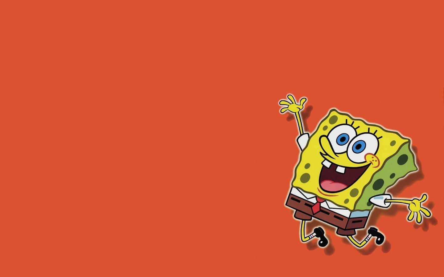 Aesthetic Spongebob 桌布 壁紙 — 海綿寶寶在純橙色背景上張開雙臂快樂地揮手。