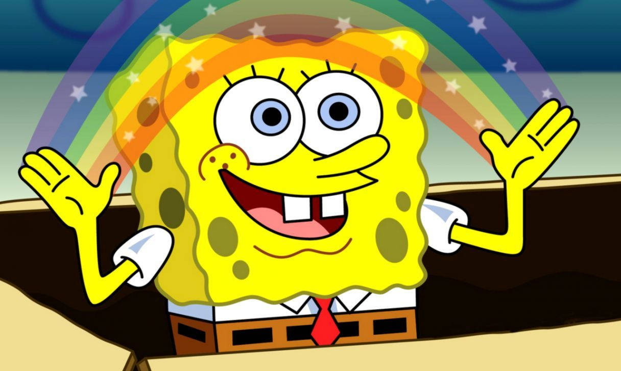spongebob squarepants 桌布 壁紙 — 海綿寶寶在身後拱起的鮮豔彩虹下洋溢著喜悅。