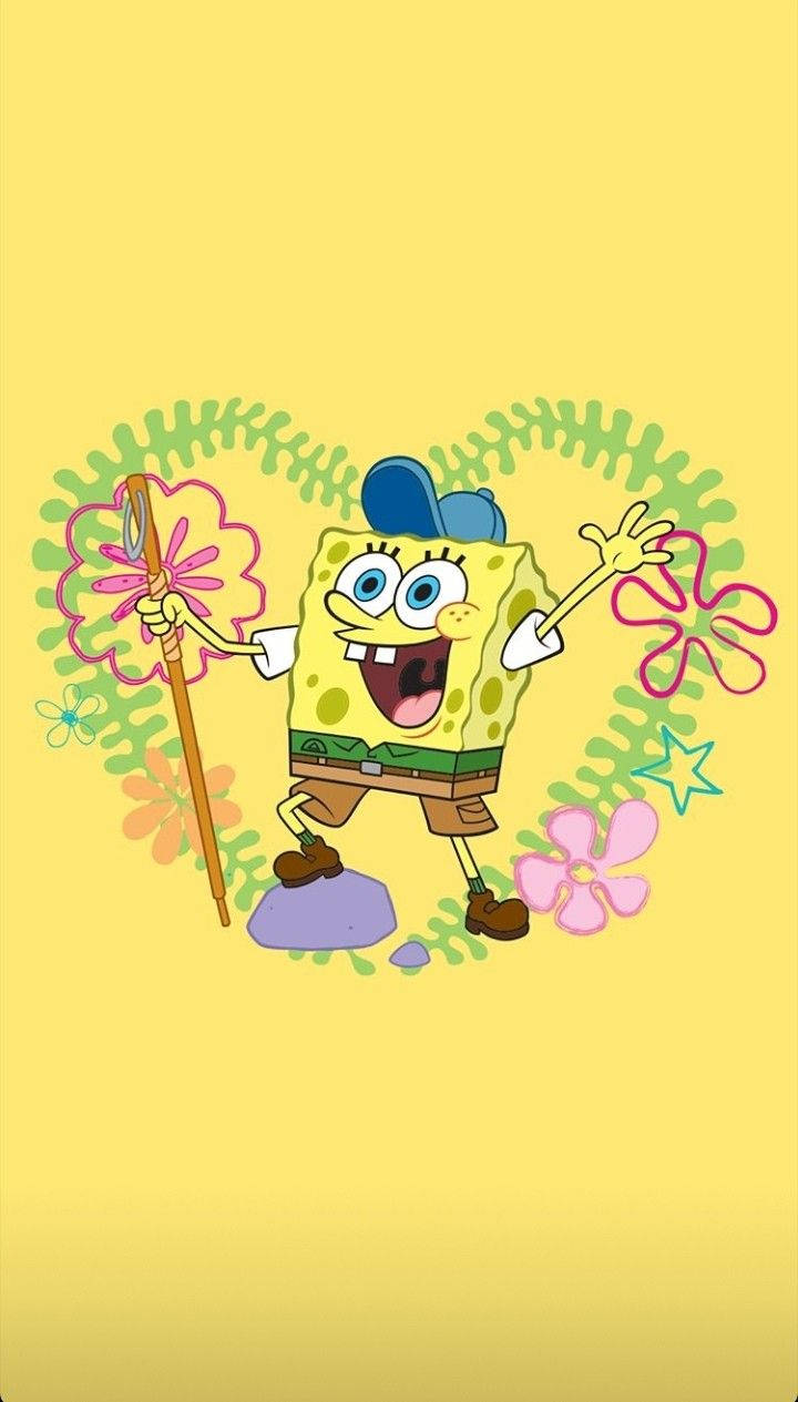 Funny Spongebob 桌布 壁紙 — 海綿寶寶快樂地拿著一朵花杖，周圍是色彩繽紛的花朵，背景是明亮的黃色。