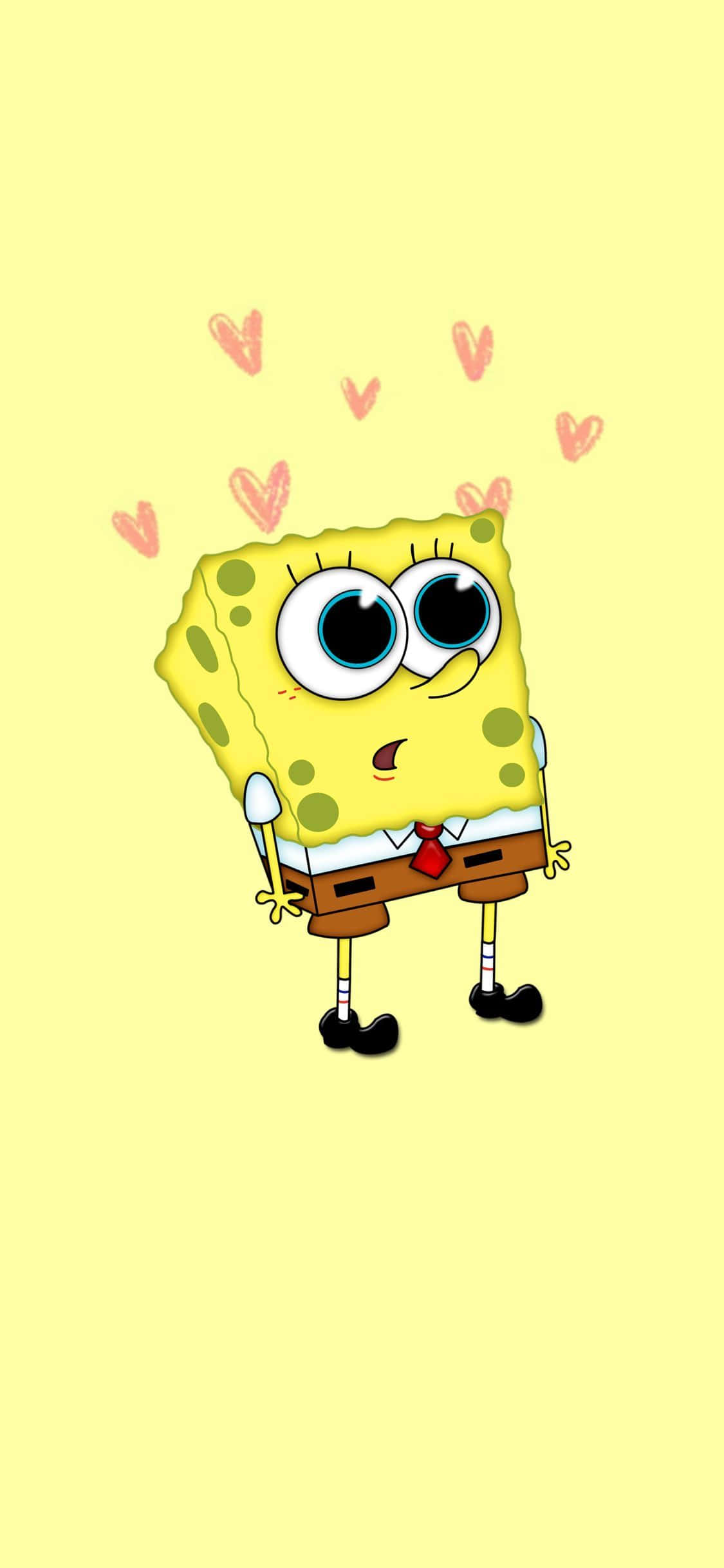 Spongebob Face 桌布 壁紙 — 海綿寶寶開心地站在淡黃色背景前，頭部周圍漂浮著粉紅色的愛心。